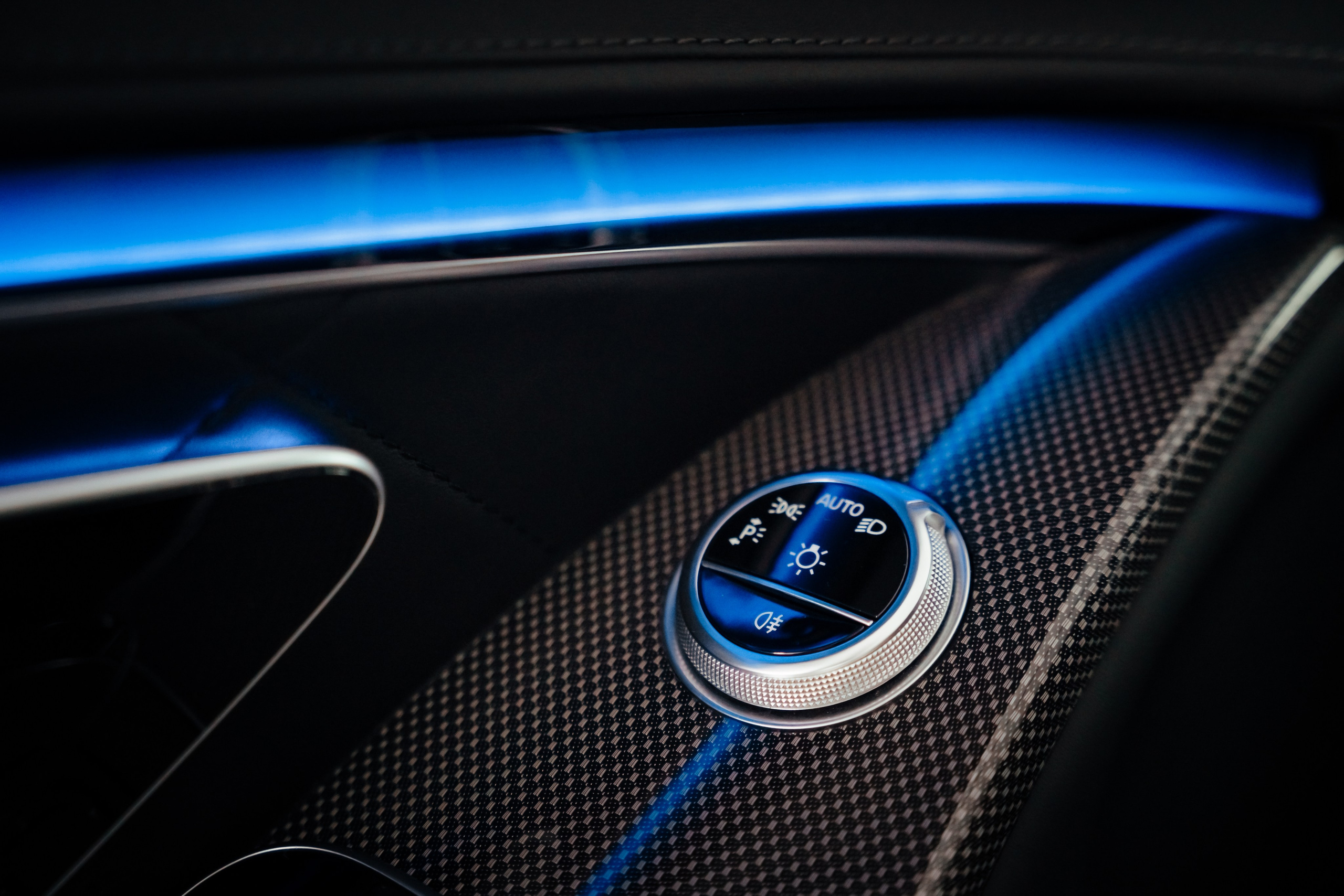 mercedes door function menu with neon light and carbon coating