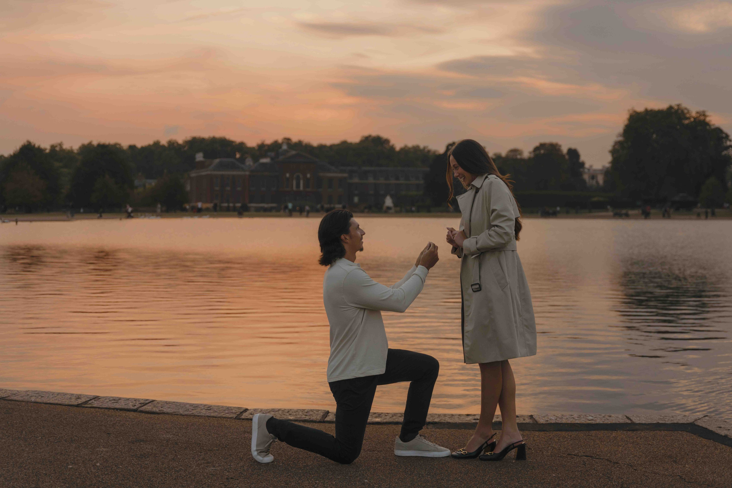 Kensington Gardens sunset with lake and Kensington Palace London golden hour