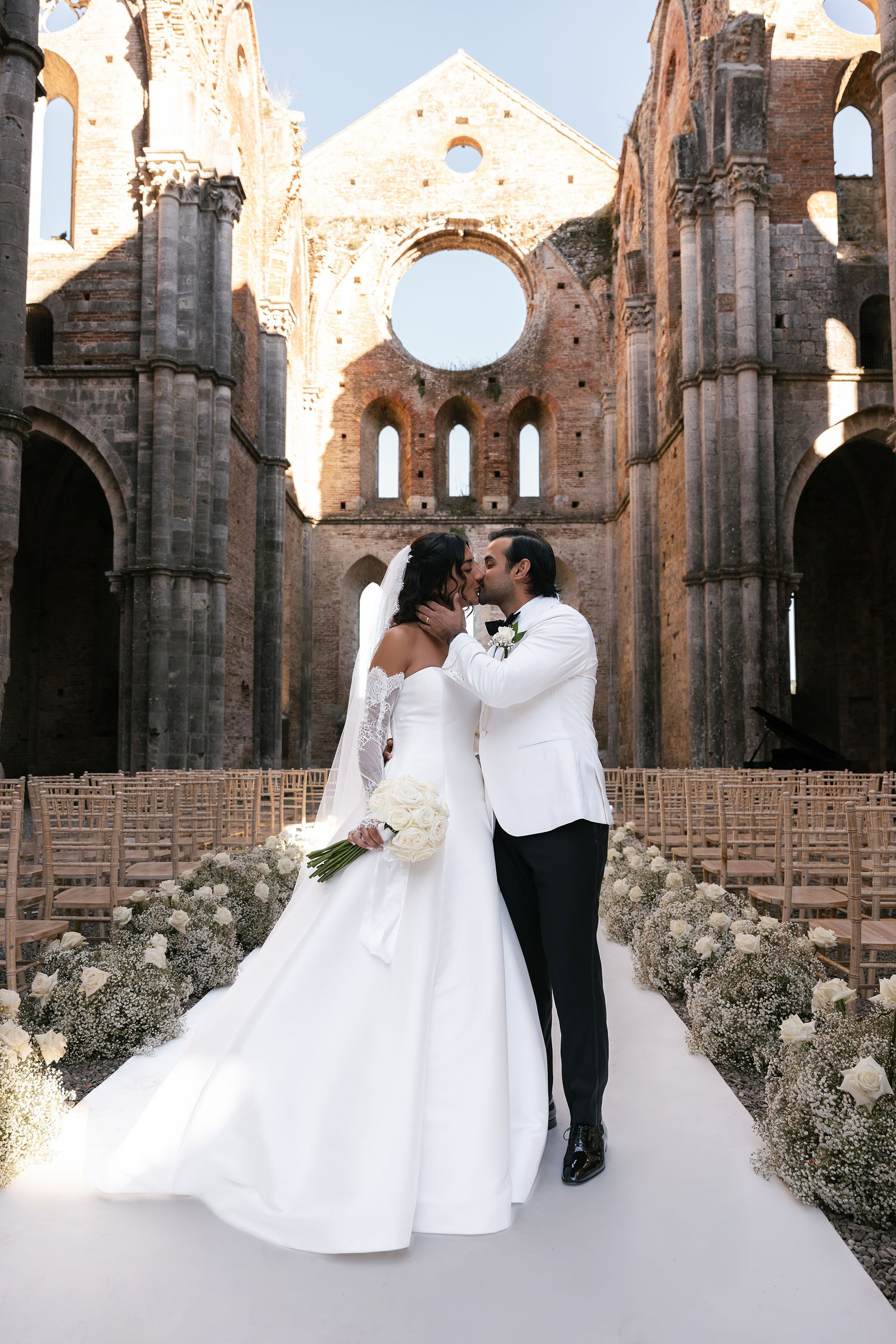 Ginevra and Avi — Abbazia di San Galgano, Tuscany. Destination Wedding Photographers and content creators based in Spain