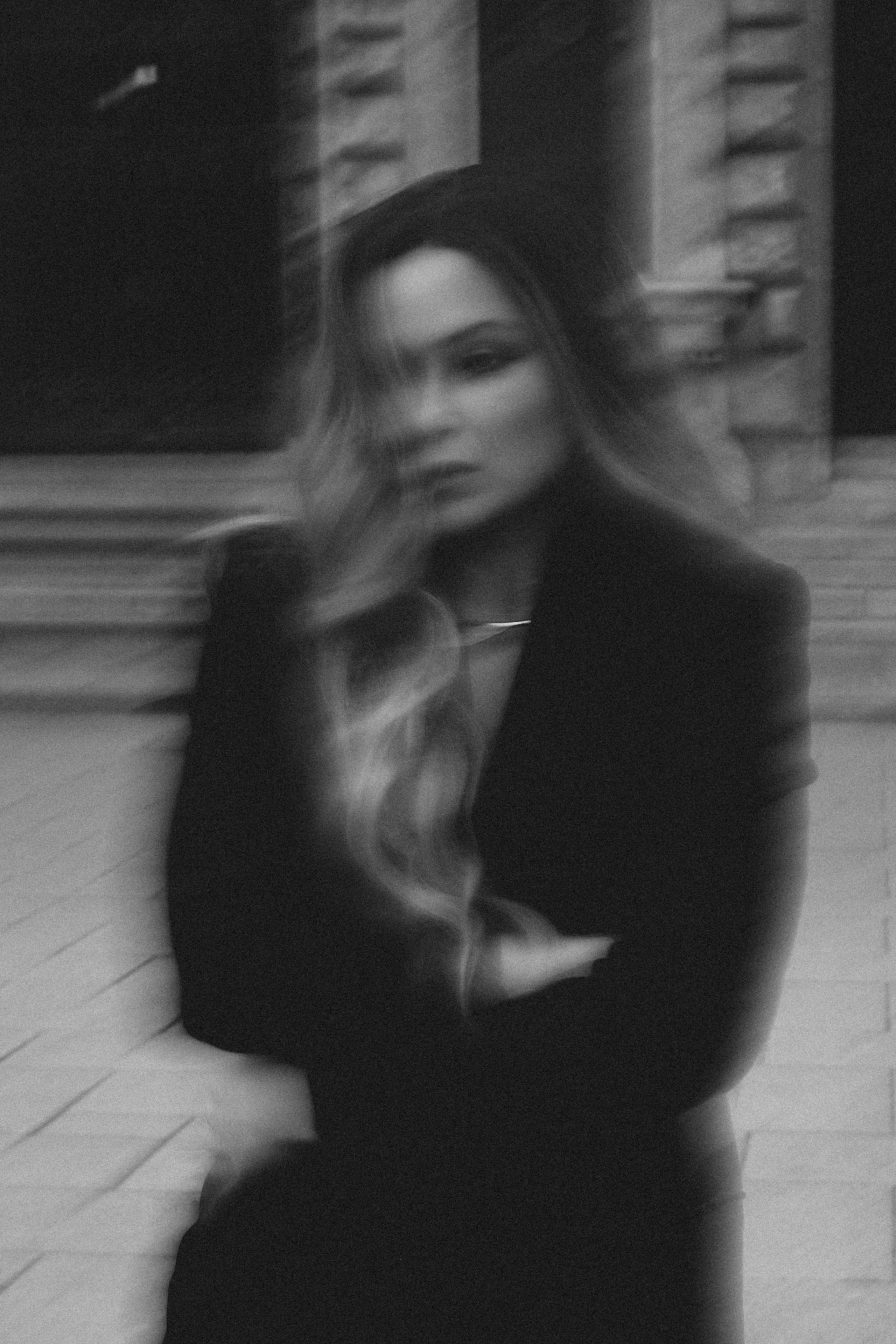 Black&White city walk. Woman in Heels&Black suit. Cinematic Portrait Photography. Kristina Kozheltsova- Soulful Portrait&Lifestyle&Love Story Photographer in Leipzig, Germany