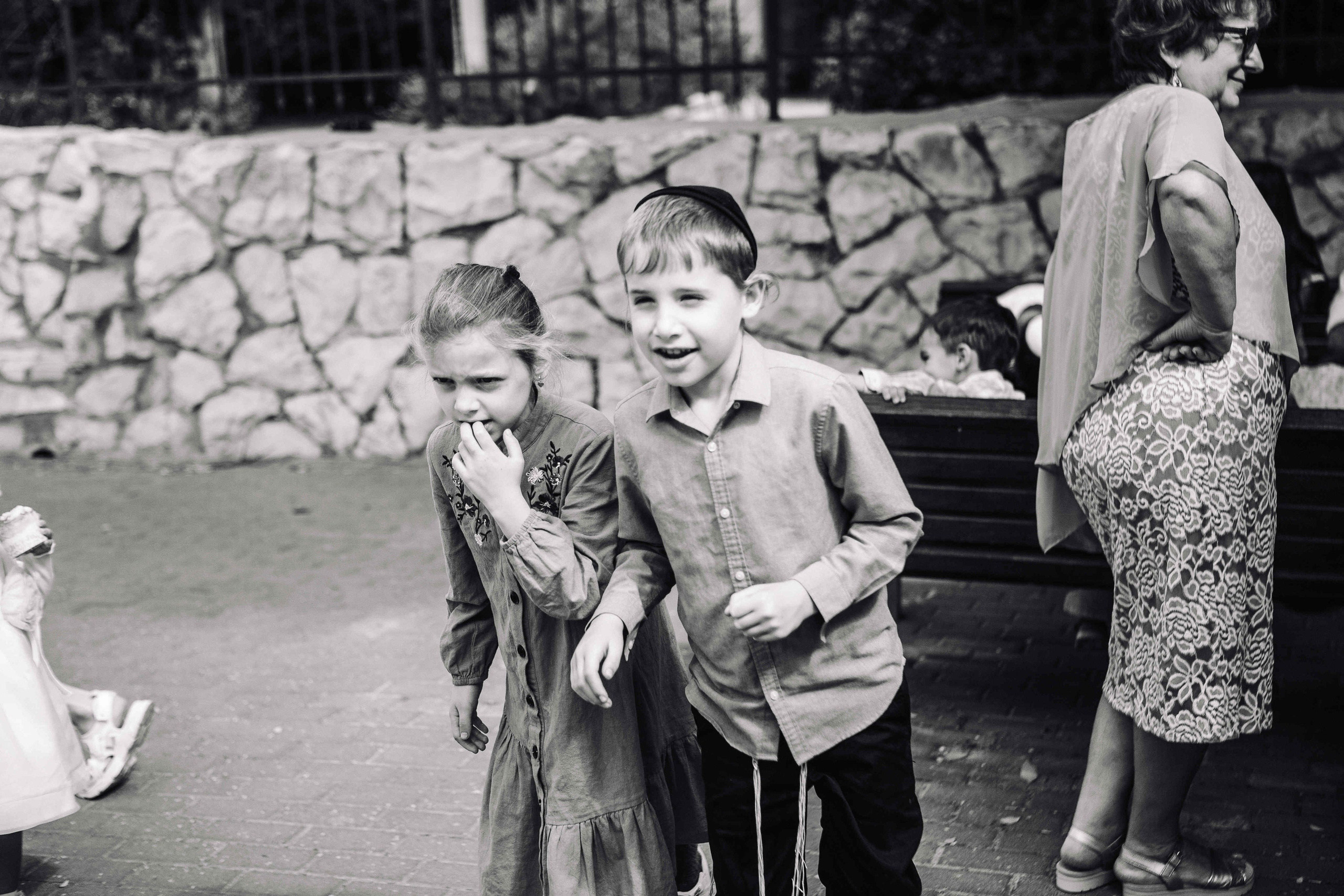 BRITH MILA IN THE SMALL SYNAGOGUE. PHOTOGRAPHER IN ISRAEL