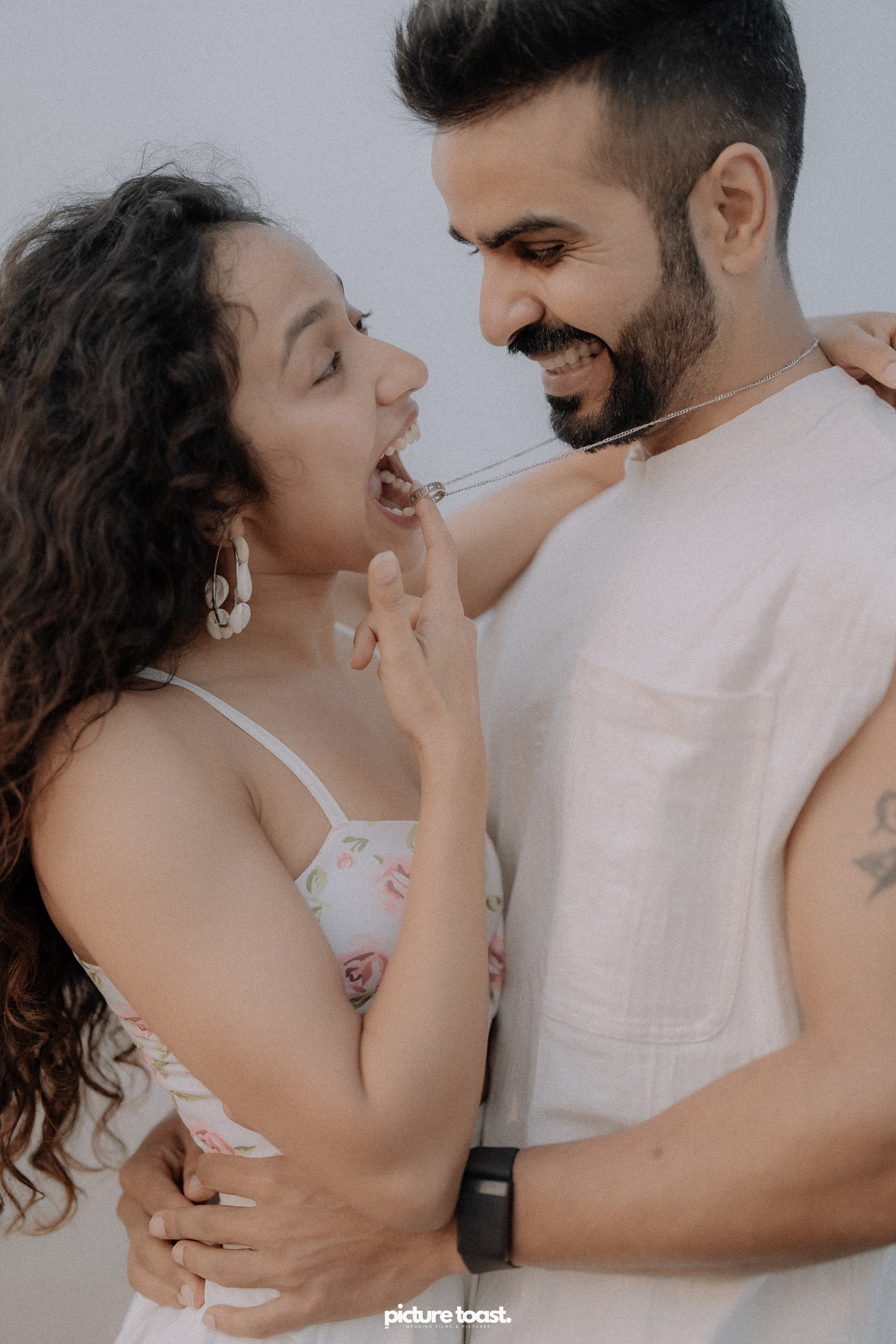 Love In The Beach. Fine art Wedding Photographers in India & Canada