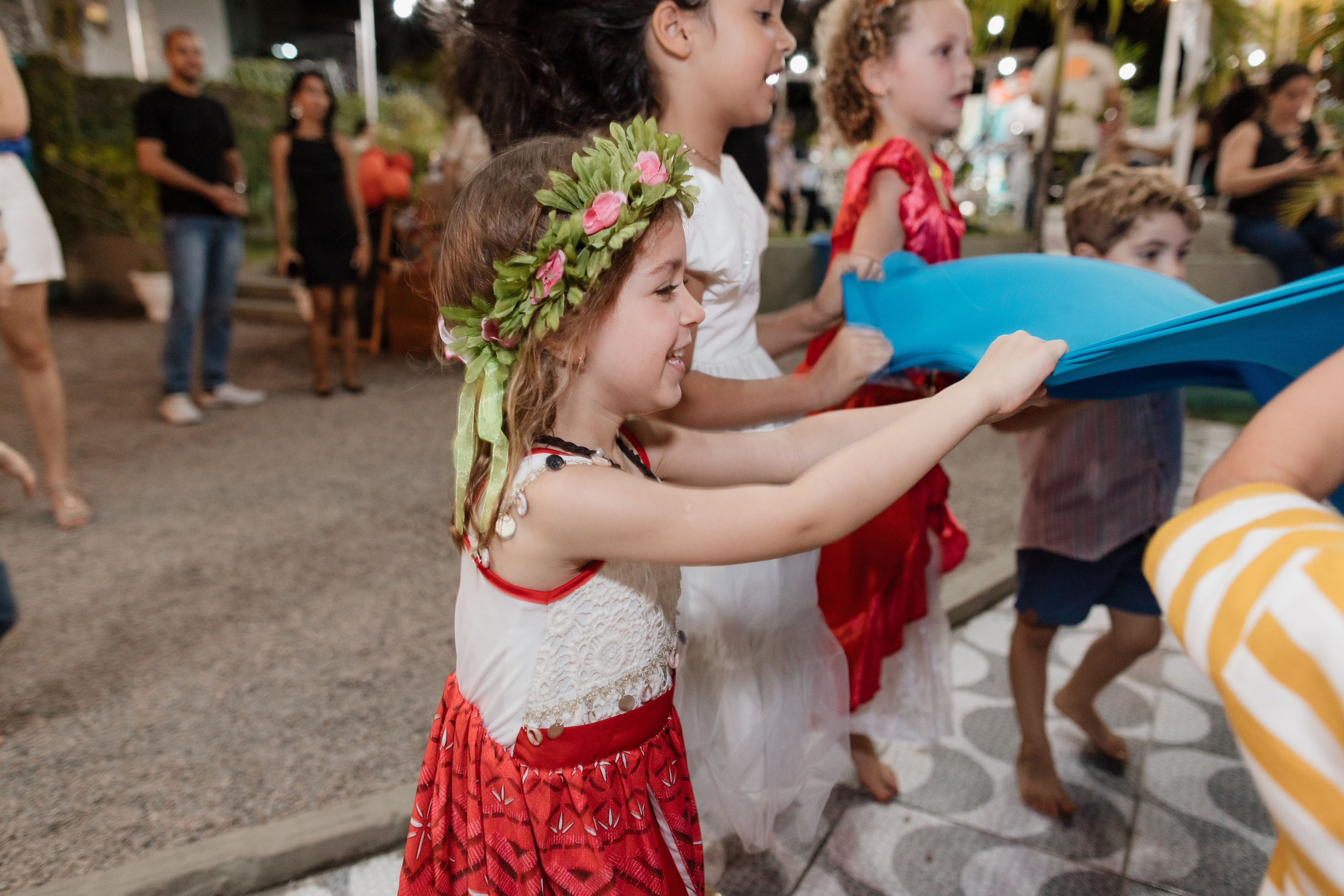 Aniversariantes aproveitando a festa