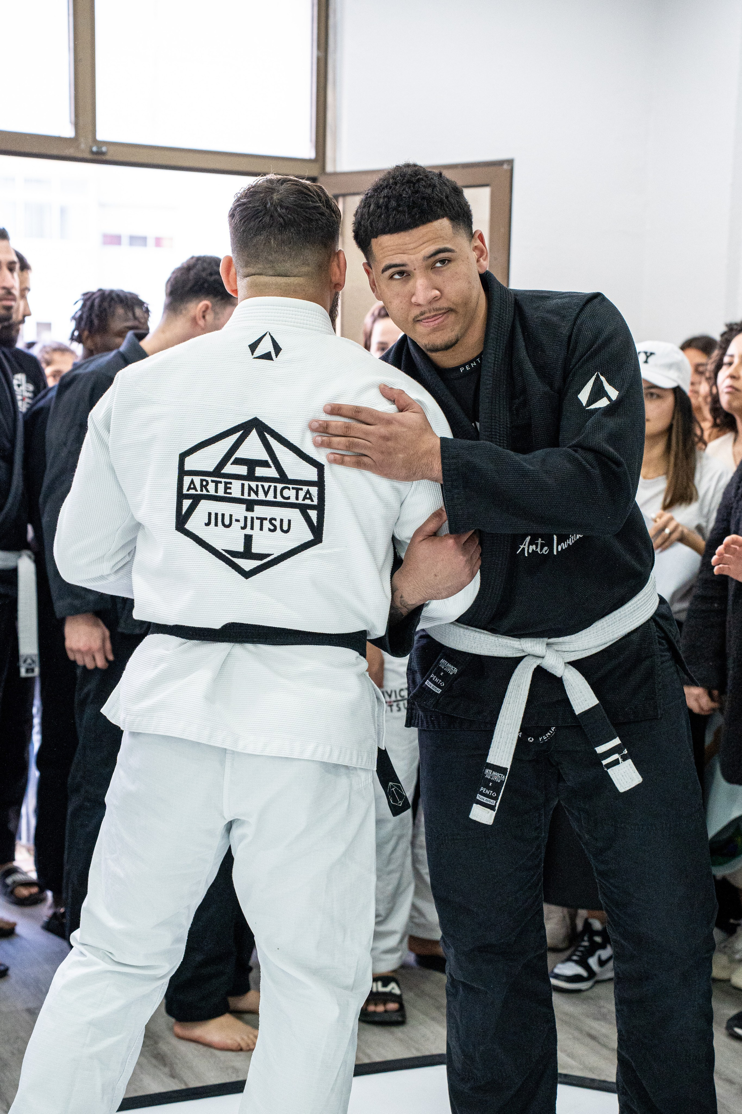 Arte Invicta — Graduação de Faixa. Frames by Giovani Braga