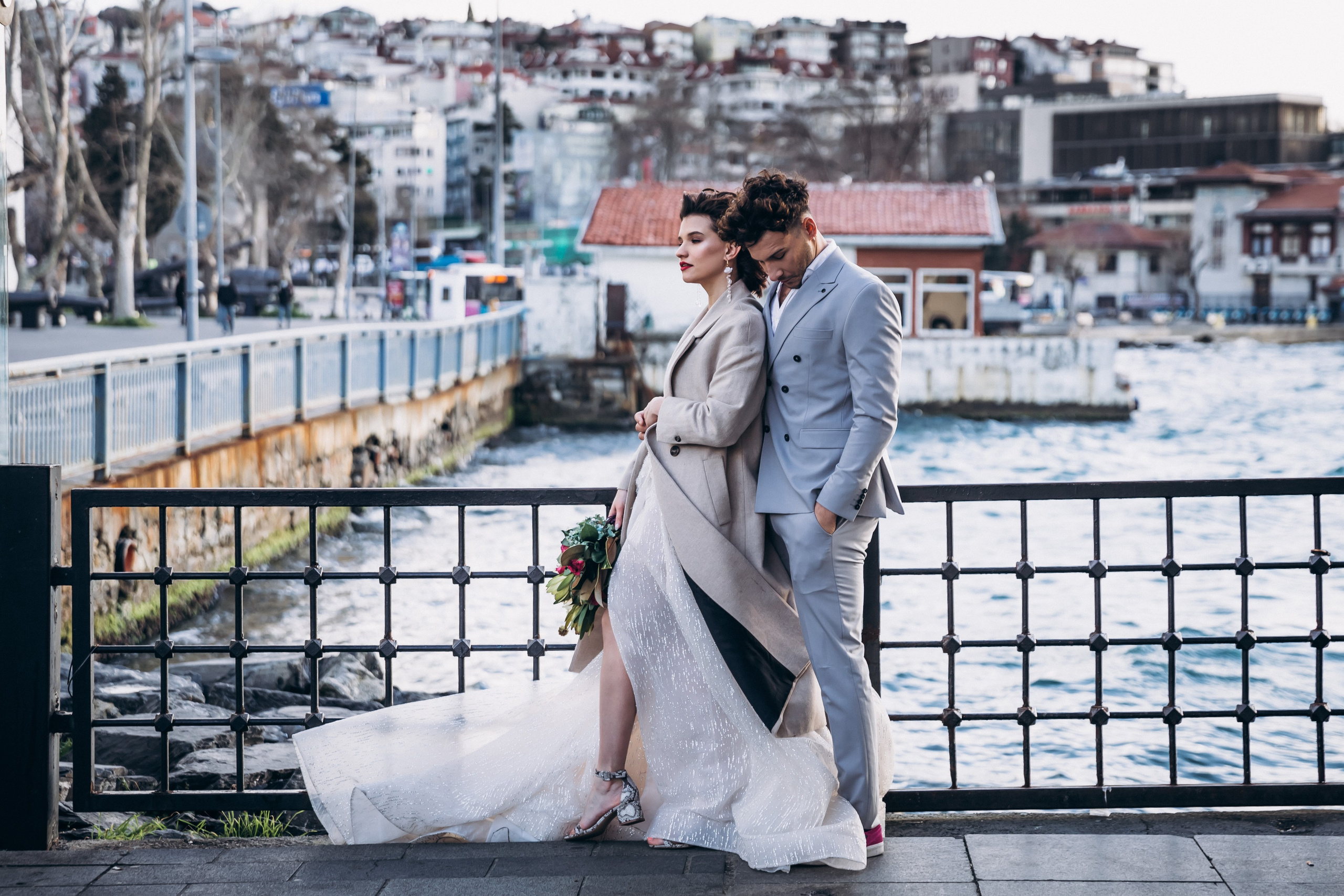 Romantic wedding portrait in front of Istanbul town hall – destination wedding Europe.