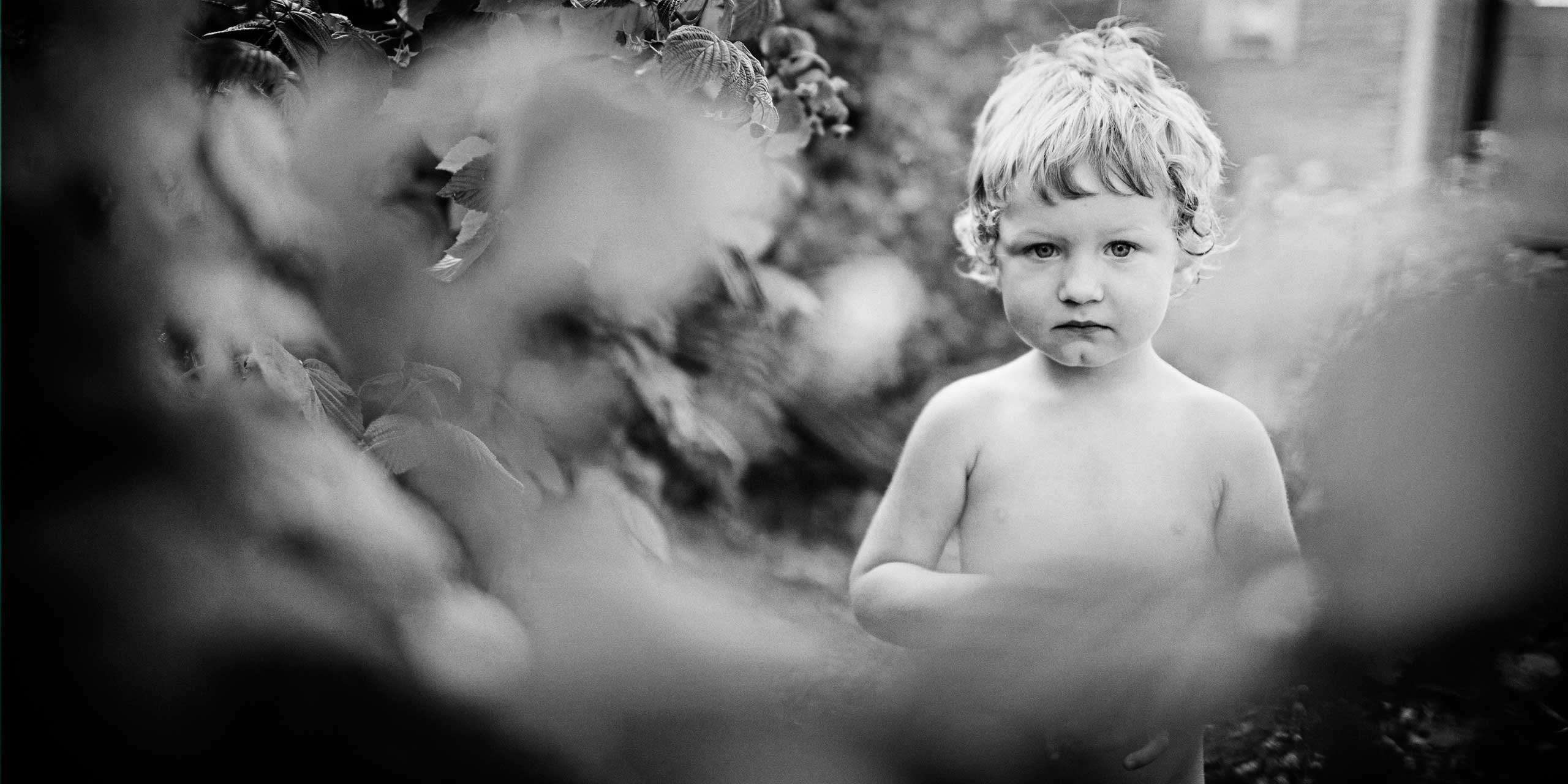 black and white dreamy portrait of a boy 