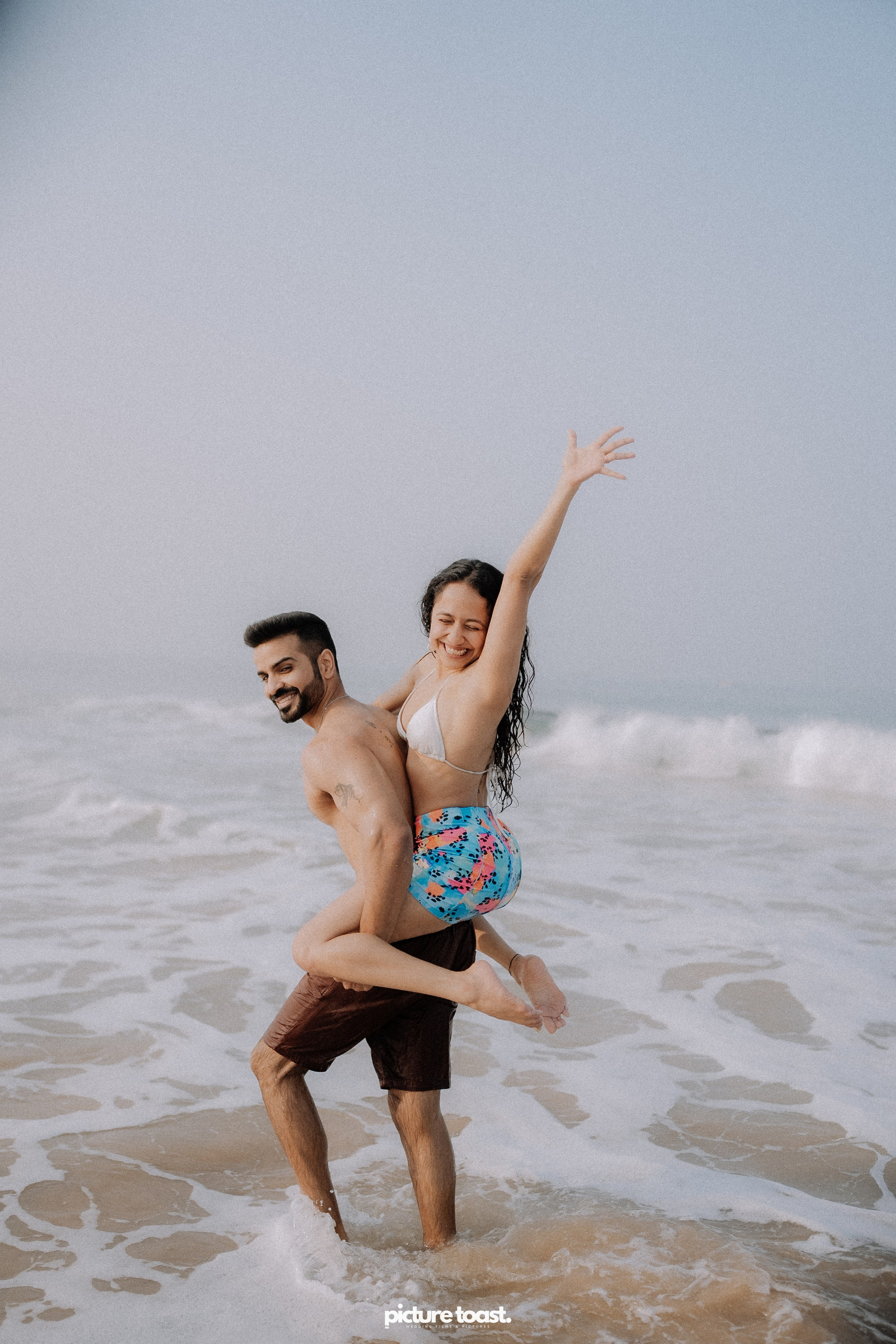 Love In The Beach. Fine art Wedding Photographers in India & Canada