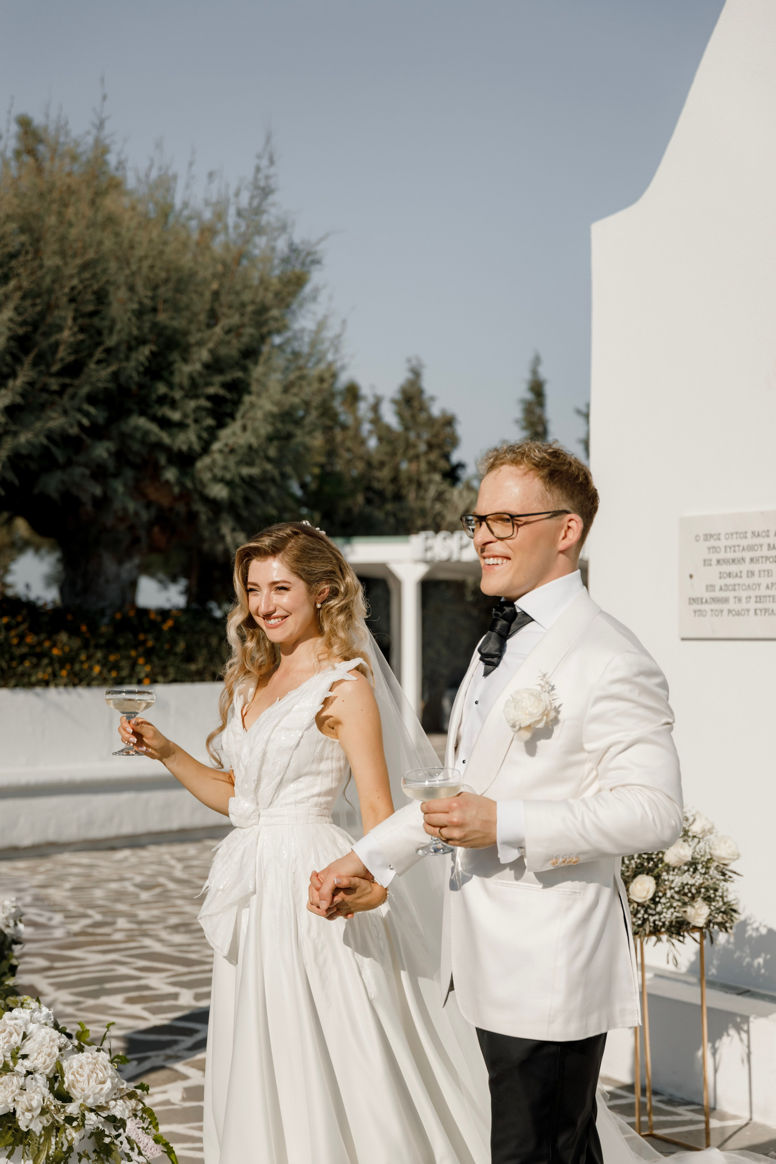 Groom and bride are happy after the ceremony in Church Agia Sofia in luxury hotel Esperos Village. Rhodes Greece