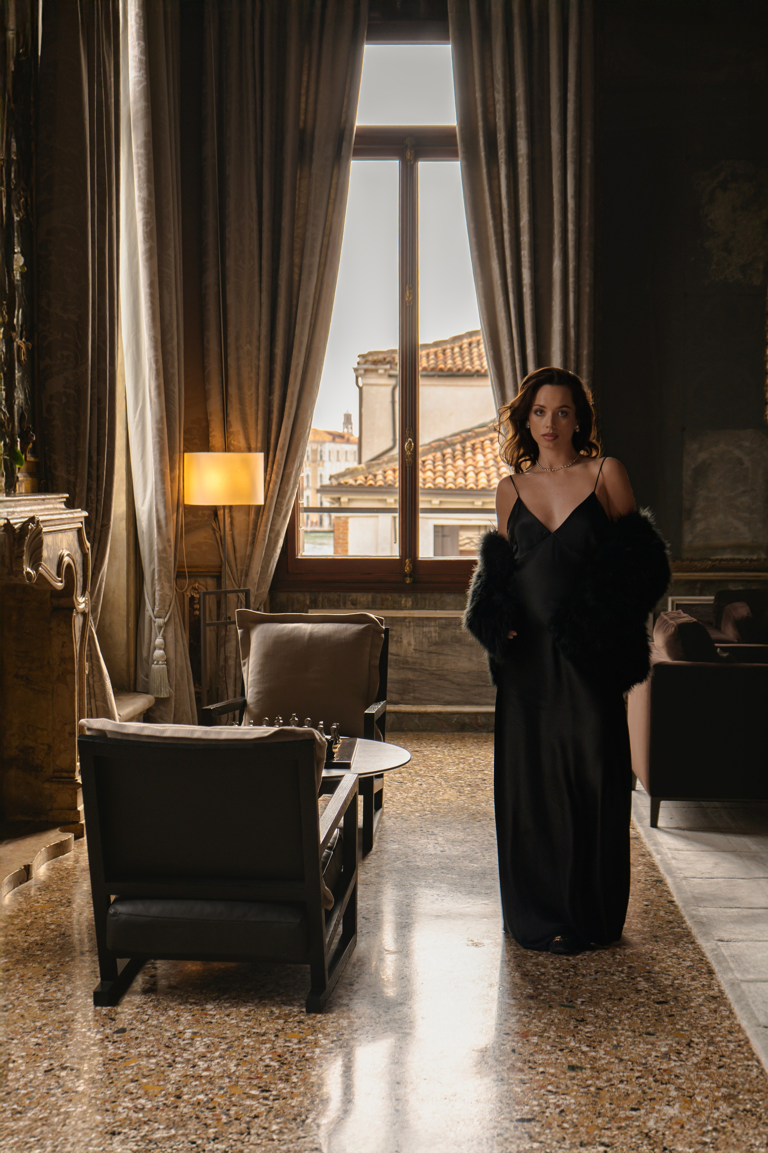  Luxury personal photoshoot in Venice on a private boat with flowing dress.