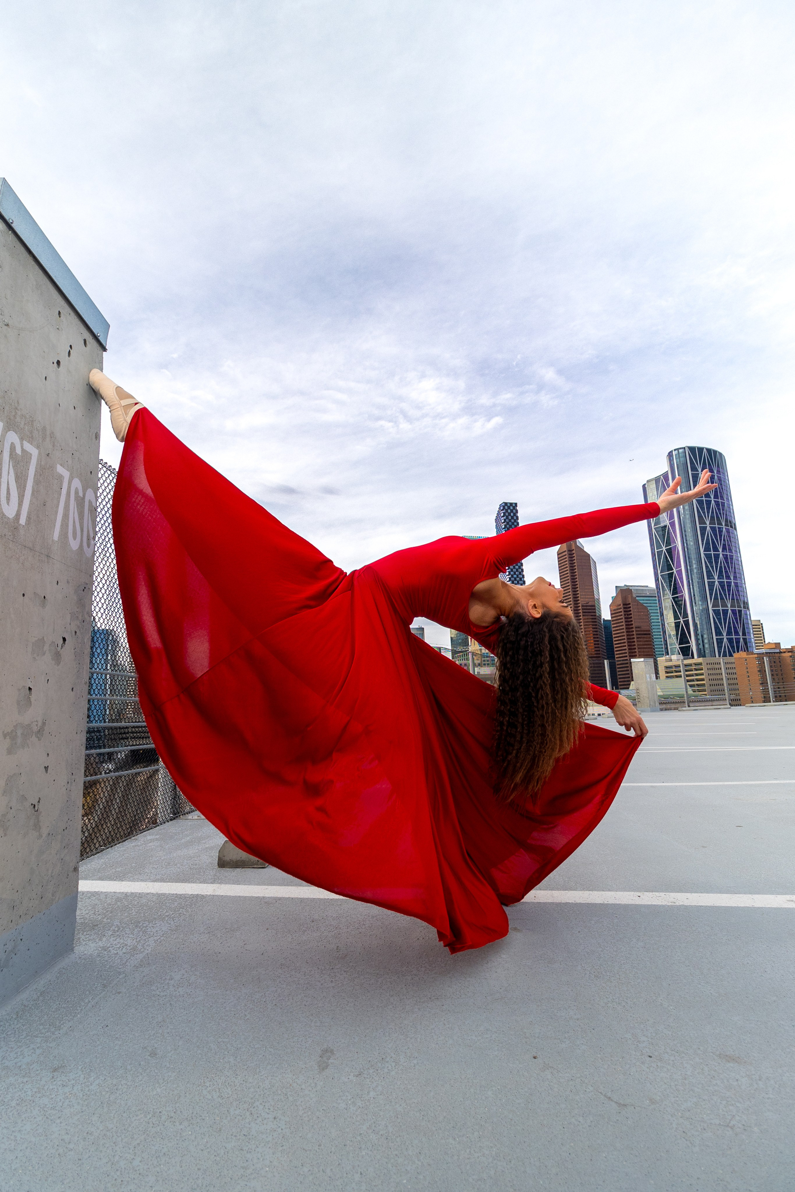 Radiant Elegance: Pamela’s Breathtaking Photoshoot in Red. ProFly.club — Professional aerial filming in Calgary