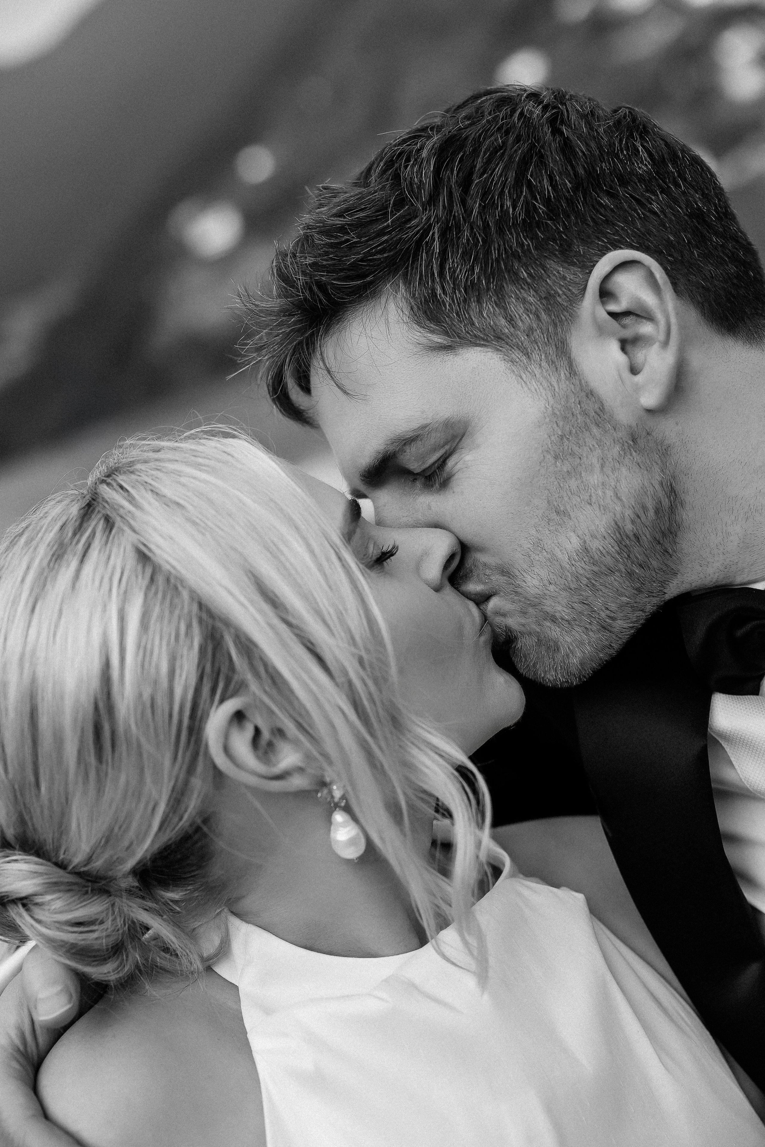 Black and white close-up of the bride and groom foreheads touching at Villa Lario, Lake Como, Italy