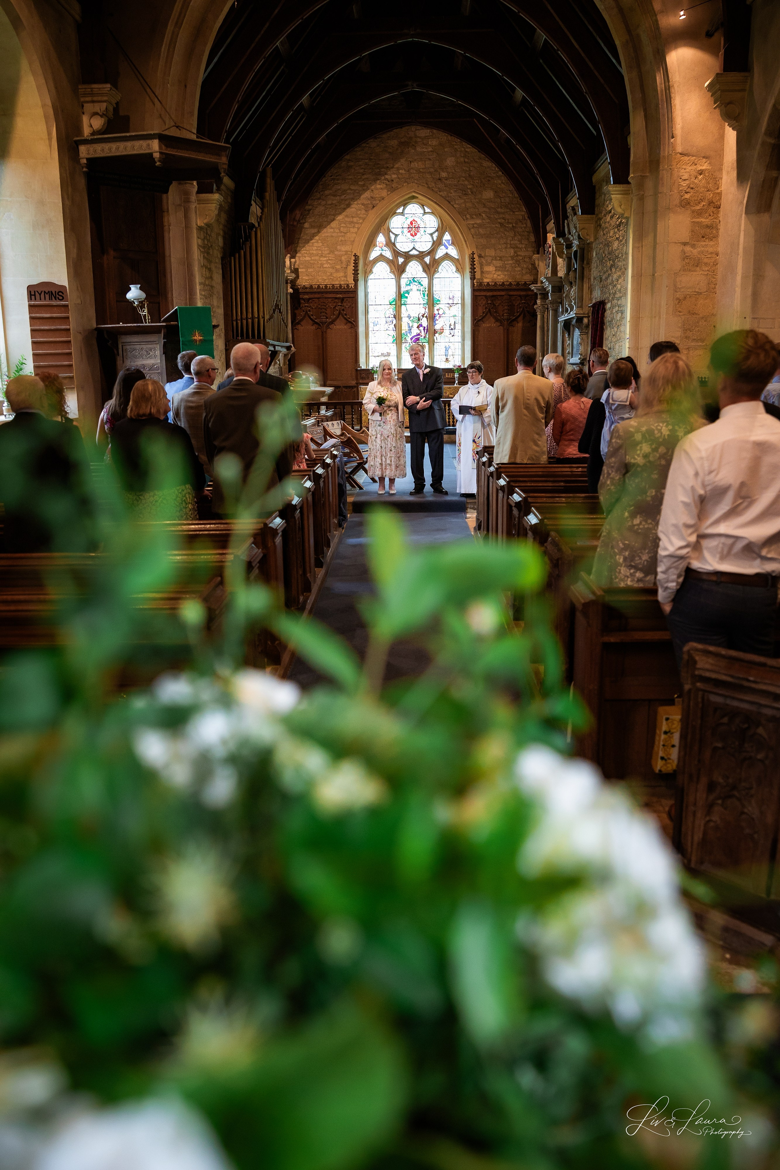 Church Wedding. Wedding and boudoir photography by Liv and Laura