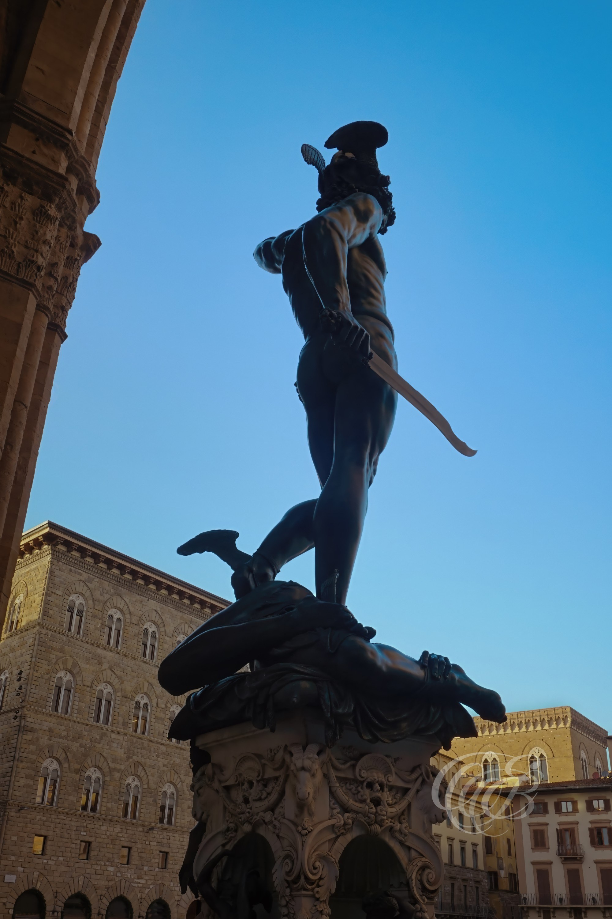 Italy — Florence — Perseus with the Head of Medusa — Bronze sculpture by Benvenuto Cellini (1545–1554) at the Loggia dei Lanzi in Piazza della Signoria — Photography by Eduardo Bartoli.
