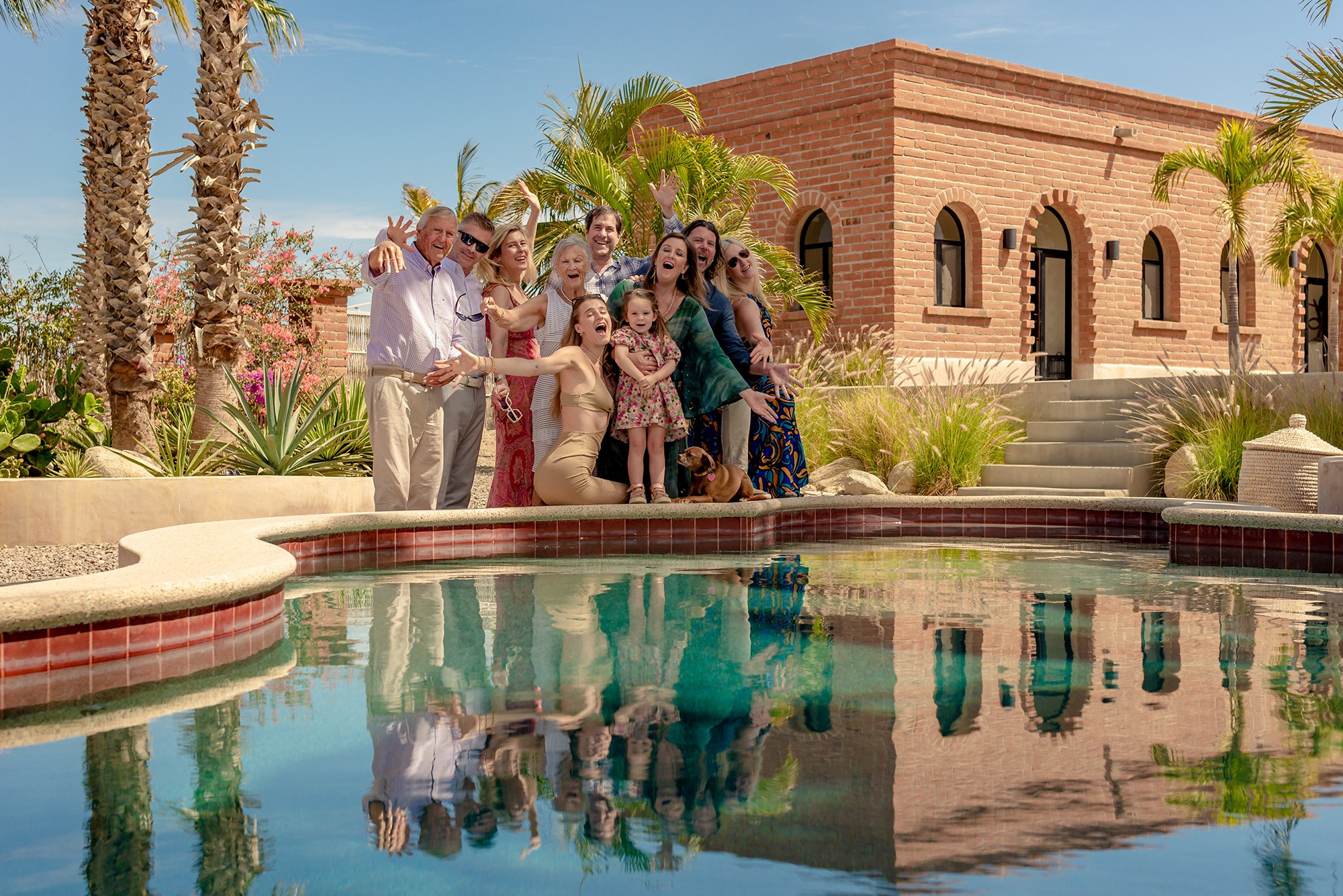 Family portrait in Todos Santos Baja California Sur – family photoshoot at Airbnb with pool reflection, artistic destination family photography