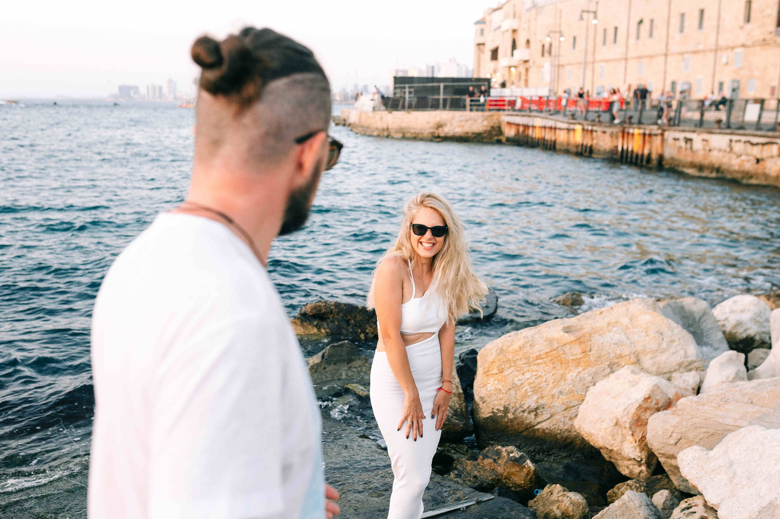 SUNSET IN JAFFO PORT. PHOTOGRAPHER IN ISRAEL