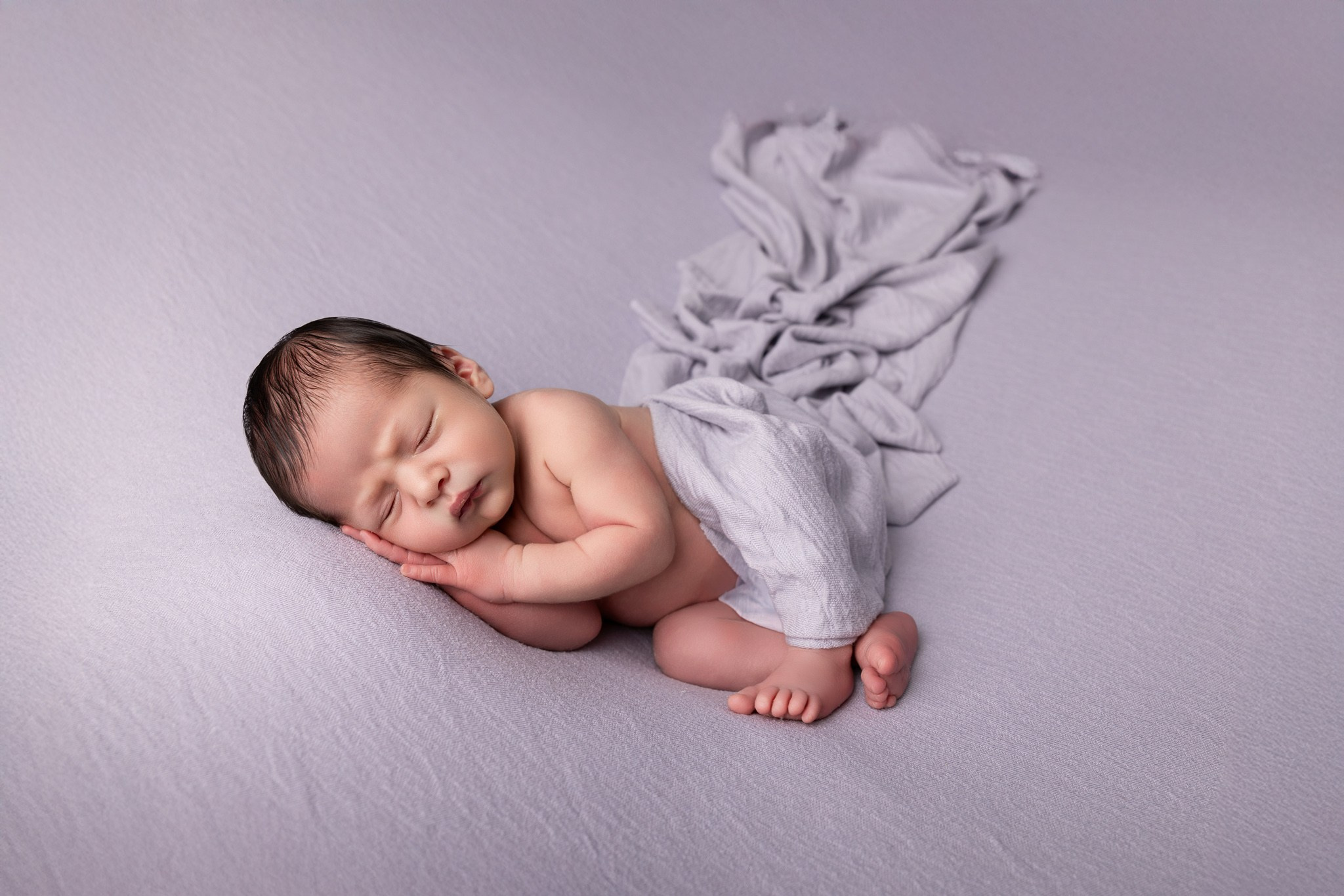 Angel Newborn Photoshoot. Professional family, maternity & newborn photographer in North Charleston, SC, creating timeless portraits