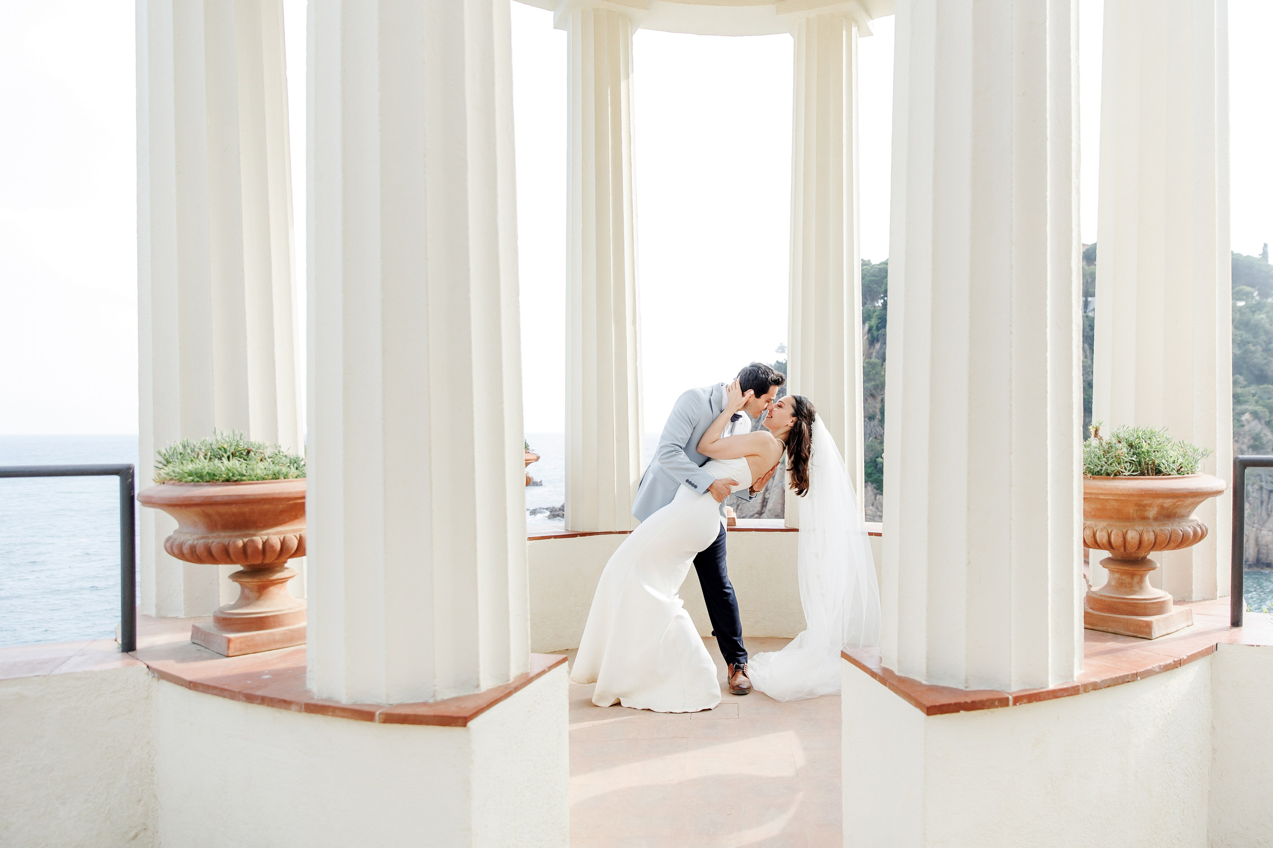 Couple exchanging a kiss during an intimate elopement in Barcelona