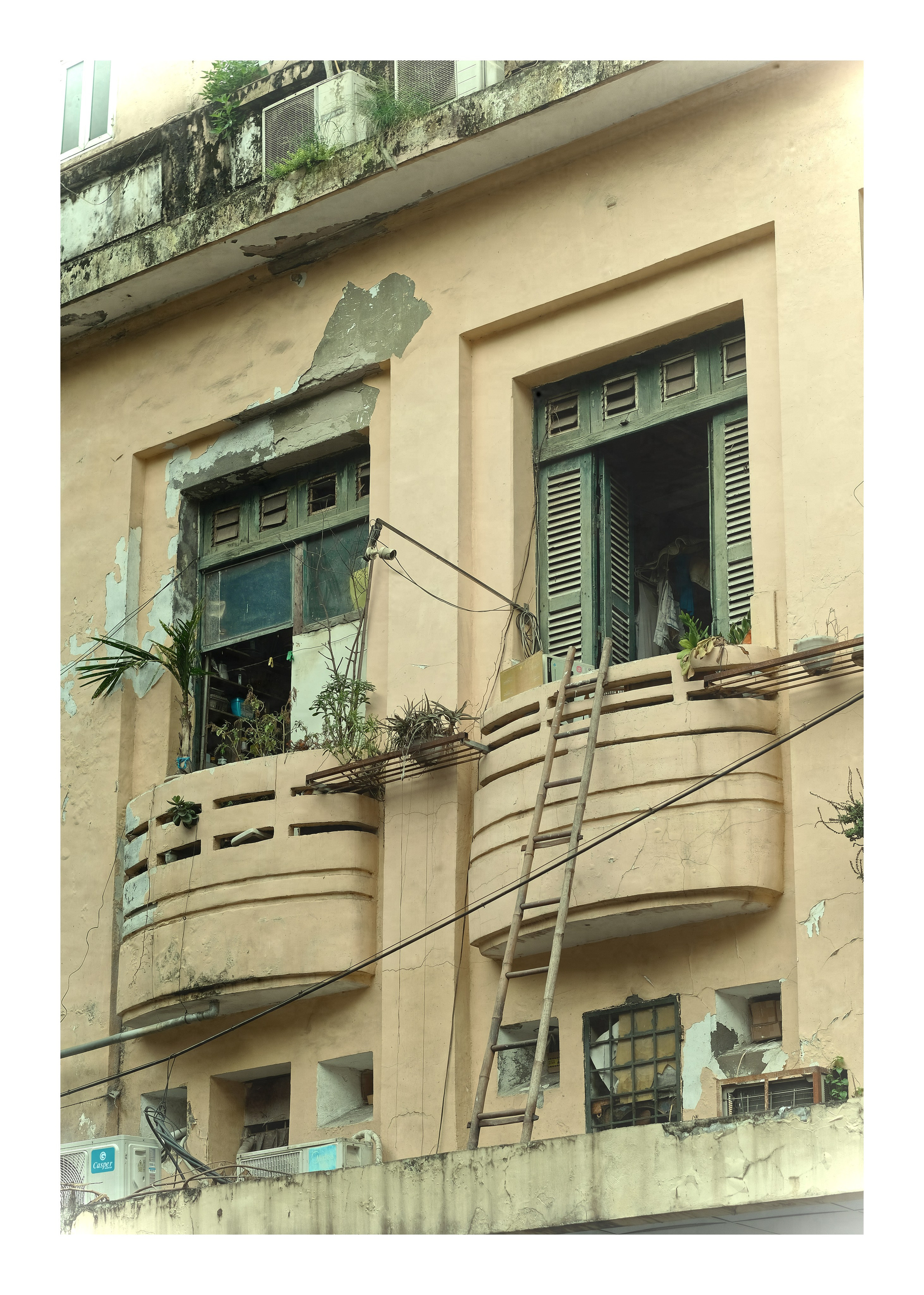 Historic Hanoi Apartment Building with Peeling Paint