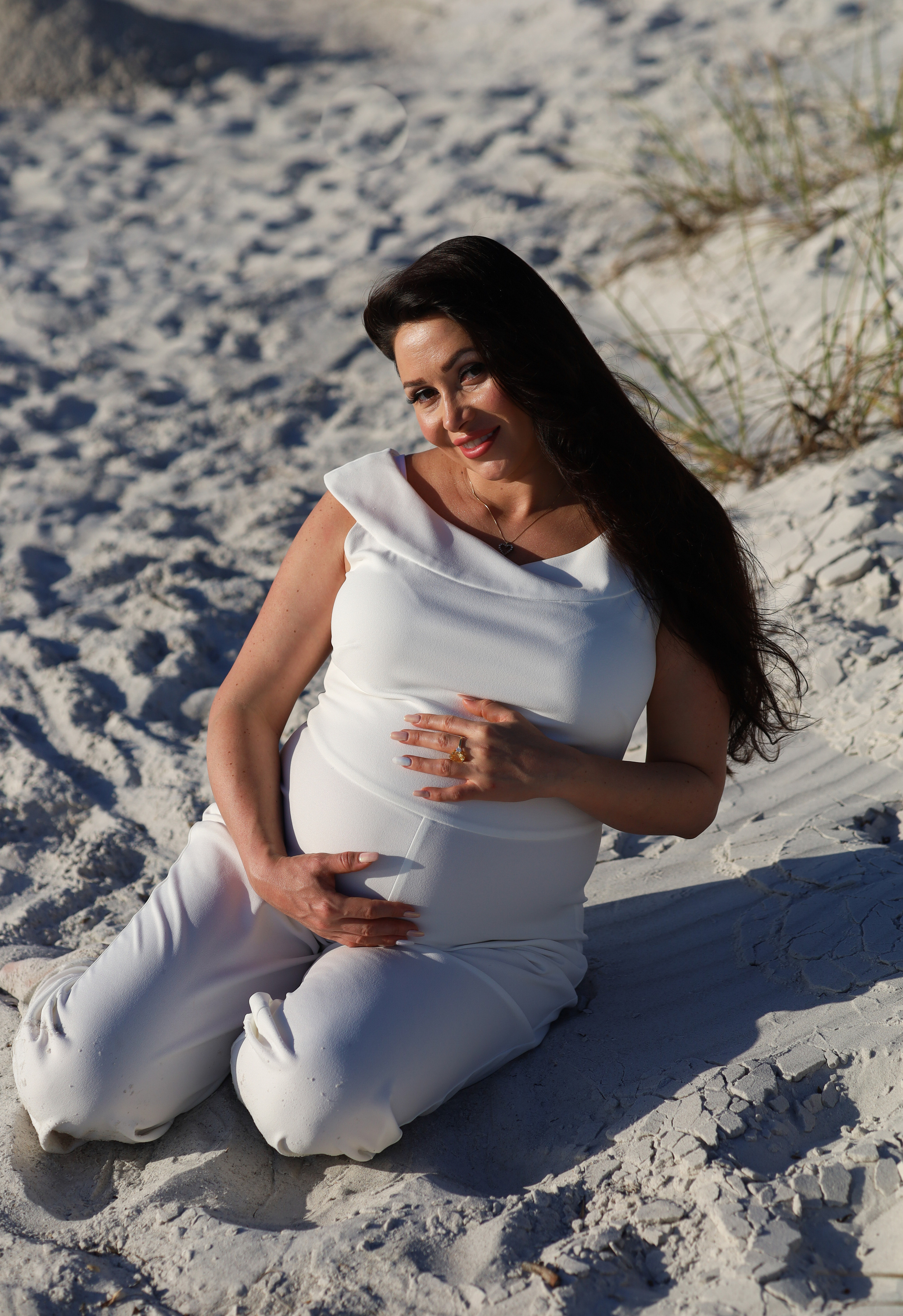 Pregnancy photo shoot on the beach, at sunset, Tampa, Florida