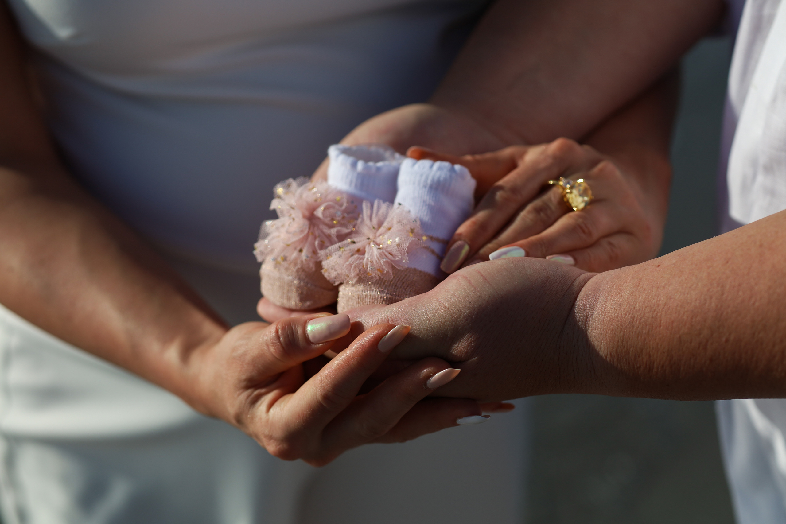 Pregnancy photo shoot on the beach, at sunset, Tampa, Florida