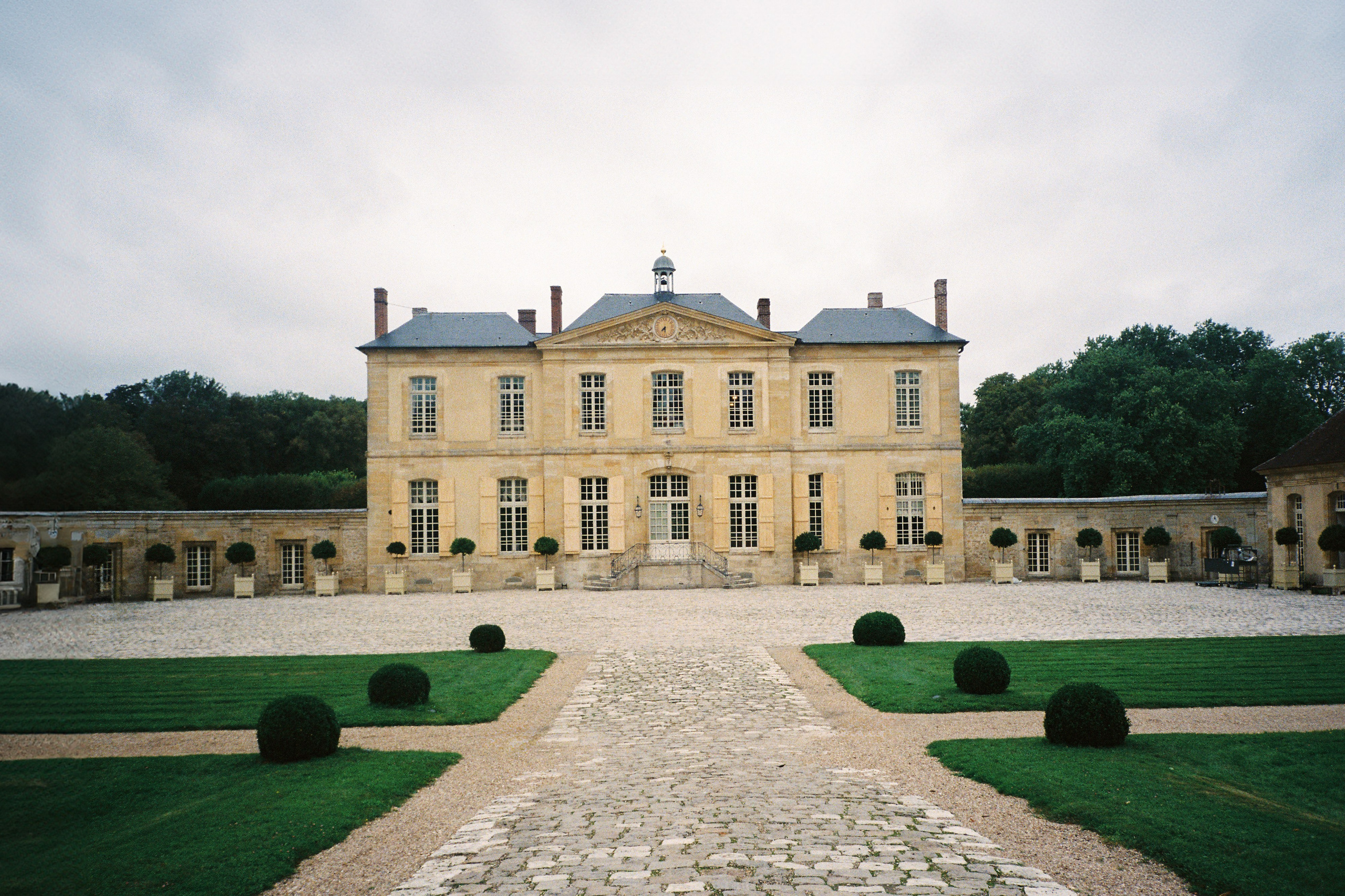 A luxury wedding at Chateau de Villette, just 40 minutes from Paris, captured entirely on film photography