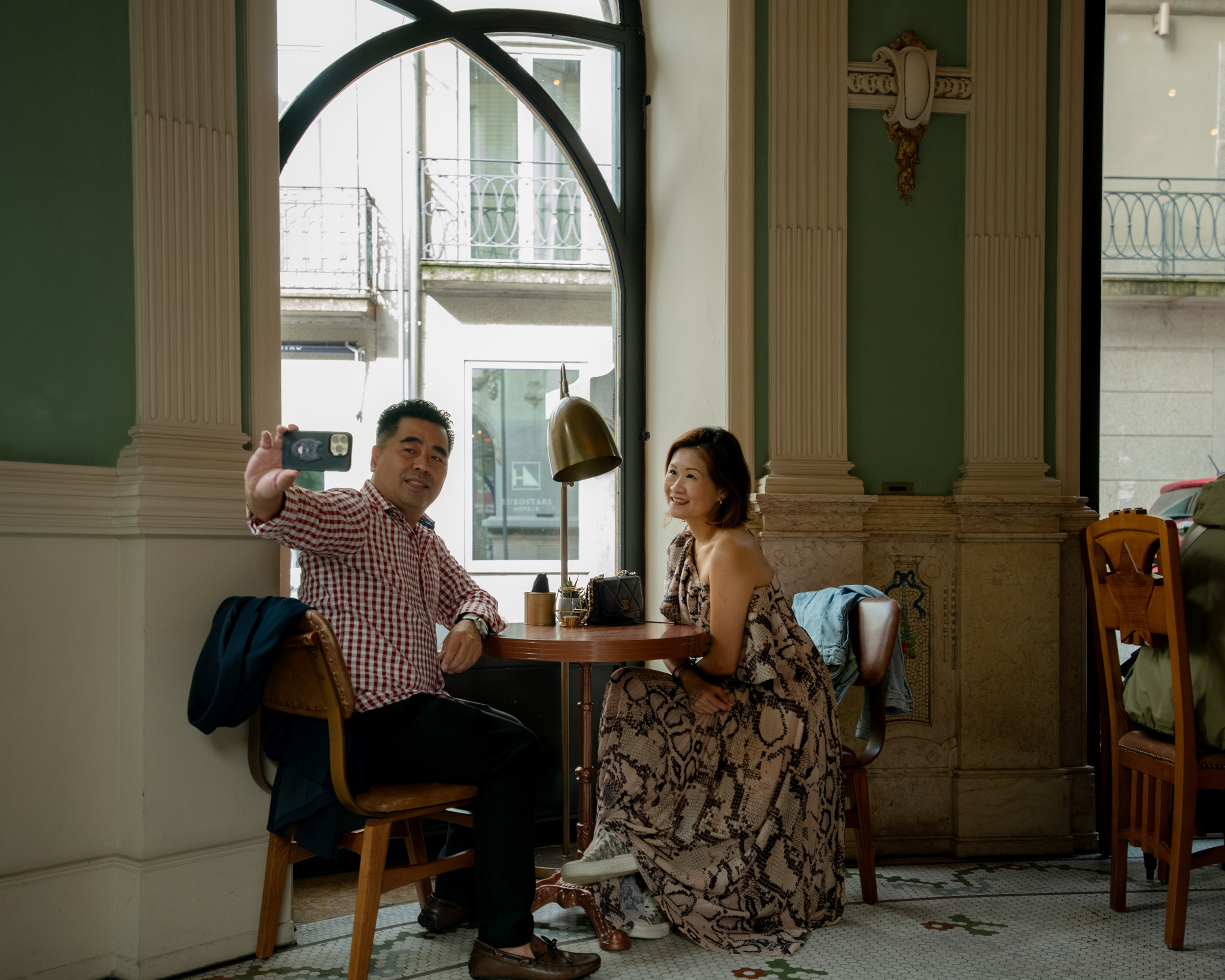 YOKE and ALFRED. Walking in Porto after the rain. Anastasiia Antoniuk portrait, family and couple photographer, Portugal