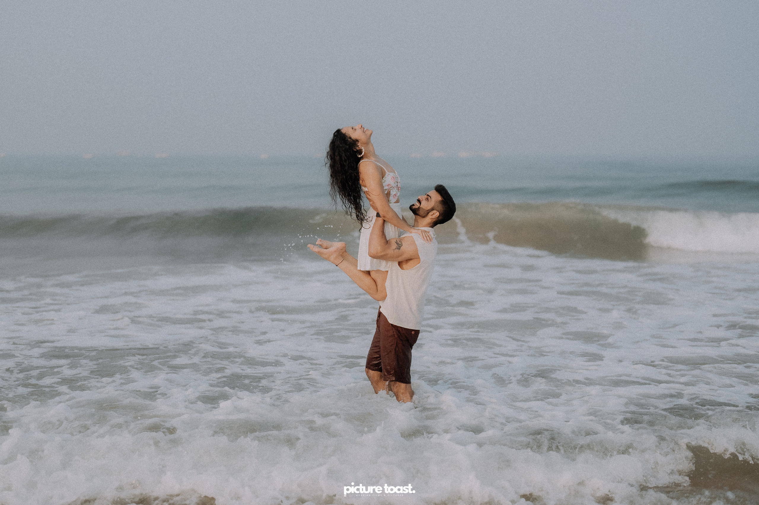 Love In The Beach. Fine art Wedding Photographers in India & Canada
