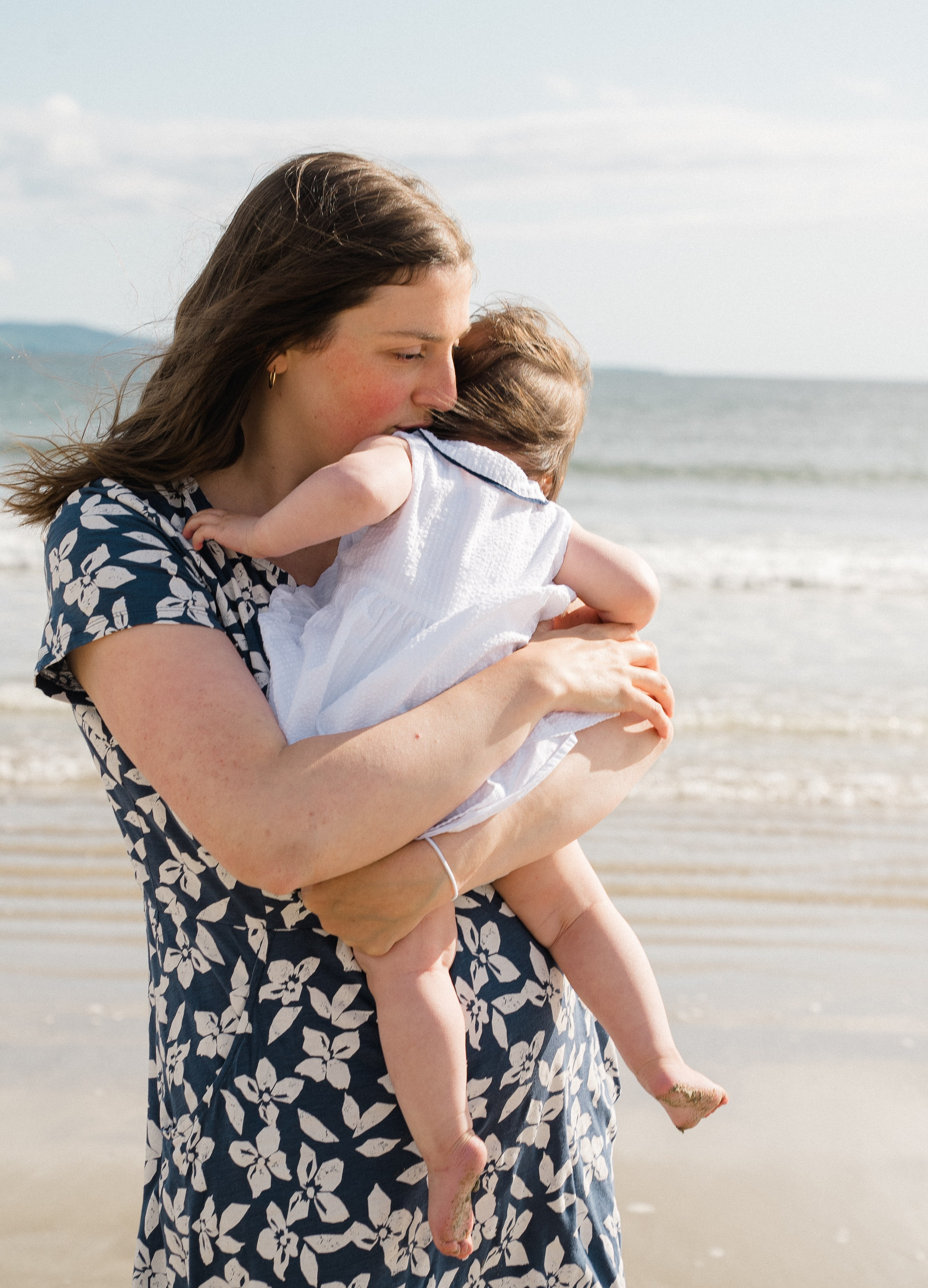 Darya and Mia at the ocean. Wedding and family photographer Ireland