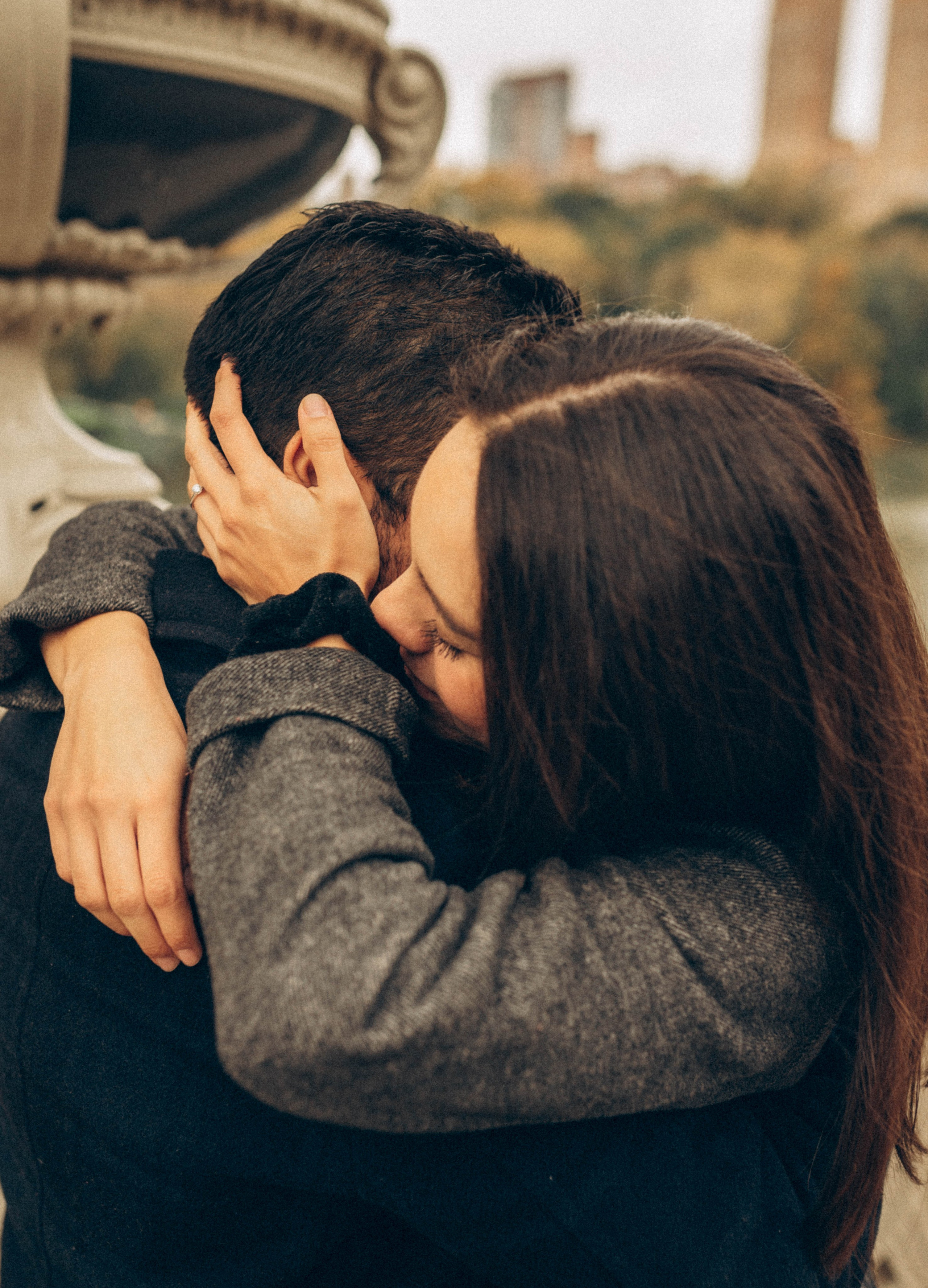 Proposal near lake in Central Park autumn.