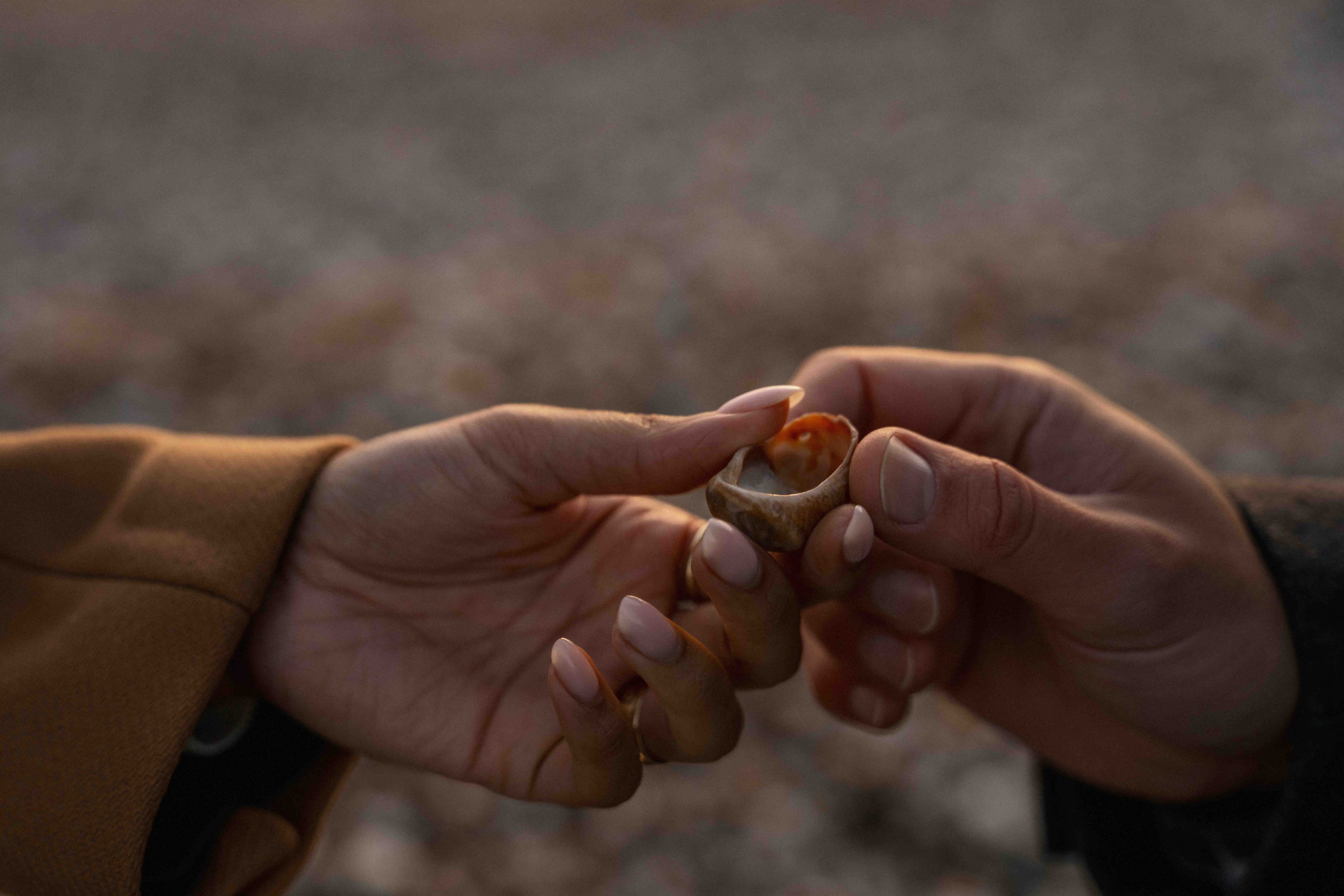 hands close up couple engagement session details seven sisters uk