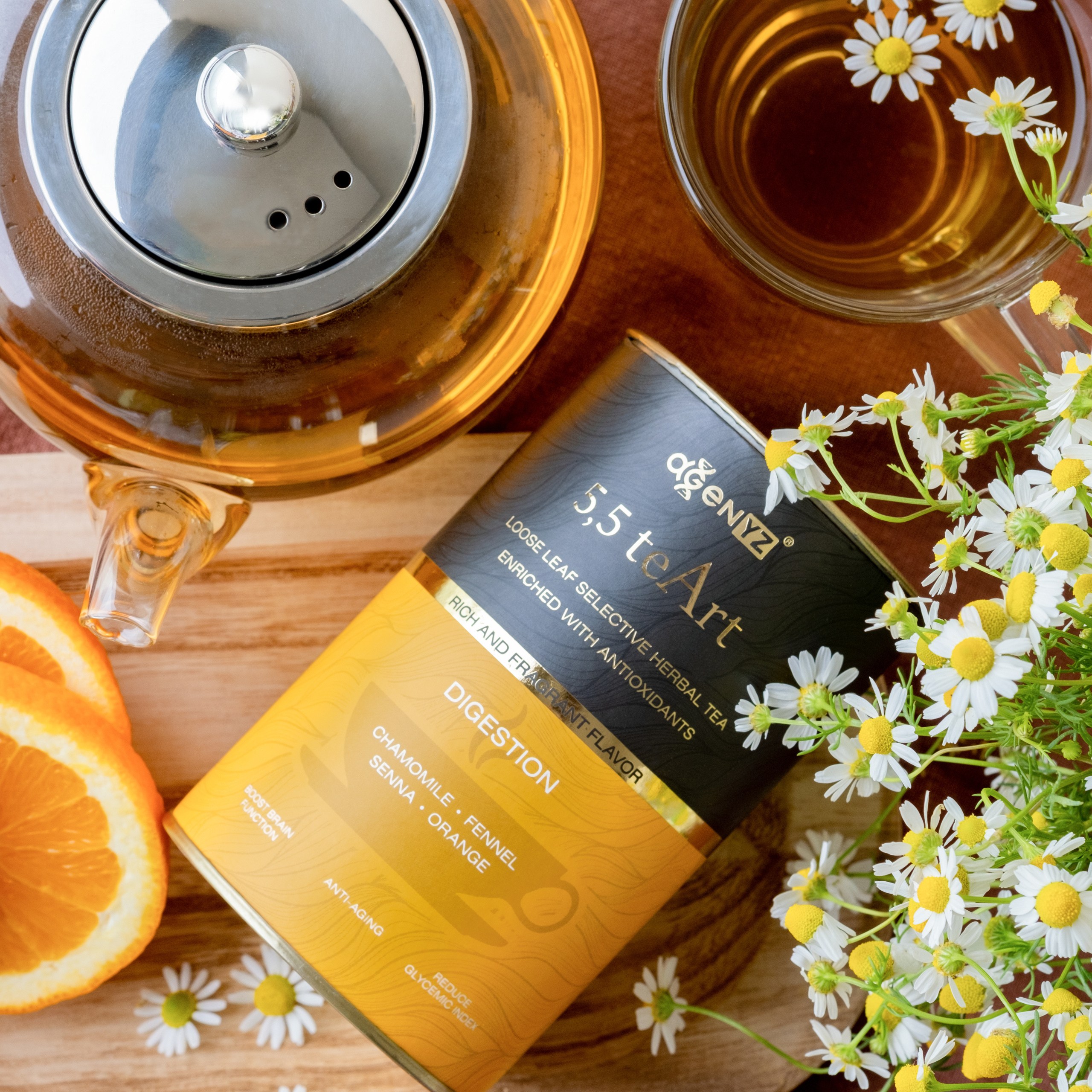 chamomile tea in the yellow box, chamomile flowers, pot of chamomile tea, cup of tea