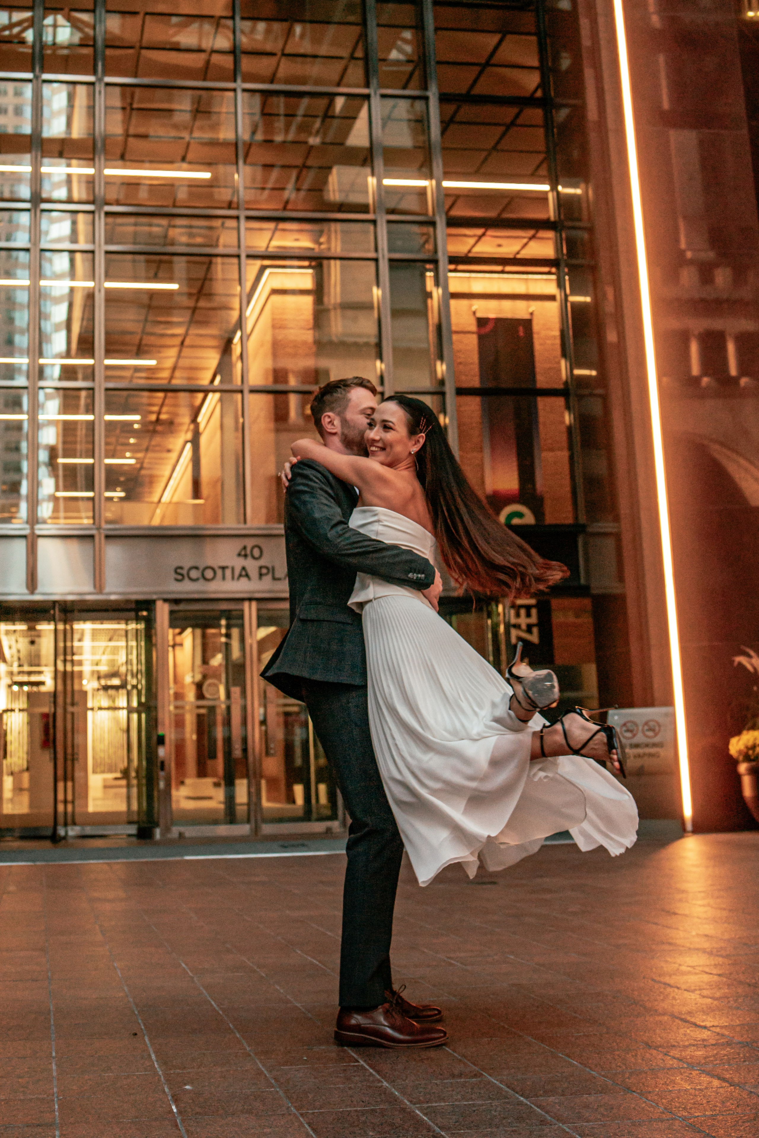 Capturing the joy of the bride, groom, and their parents in timeless wedding photos in Windsor.