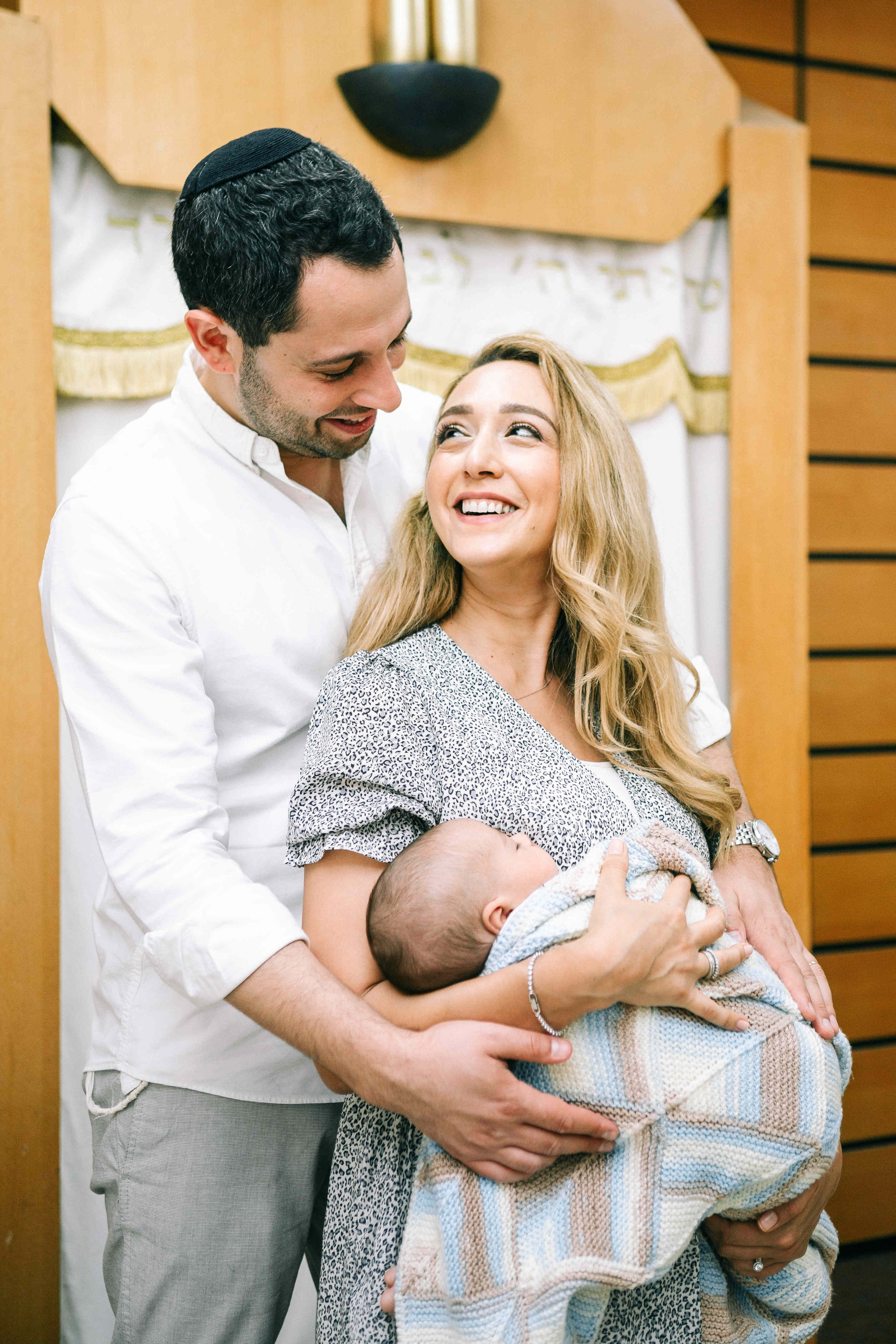 BRITH MILA IN THE SMALL SYNAGOGUE. PHOTOGRAPHER IN ISRAEL