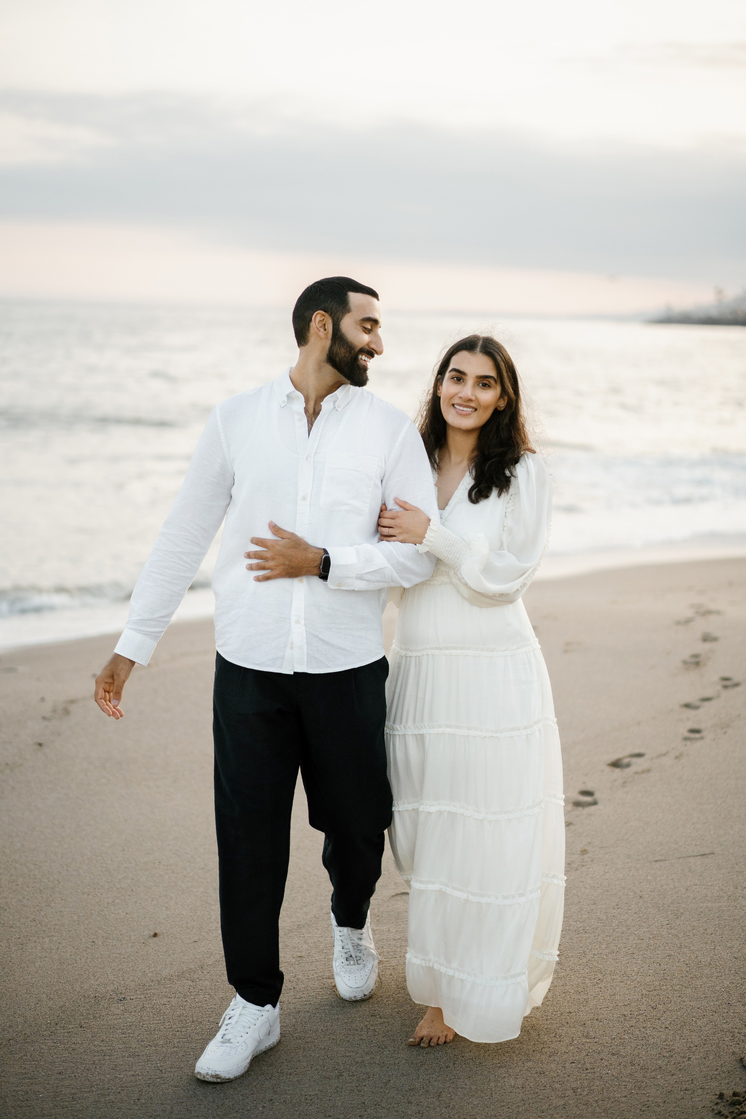 Santa Monica Sunset Engagement Photoshoot. Wedding Photography & Videography Team in California, Los Angeles, San Francisco, San Diego and Travel