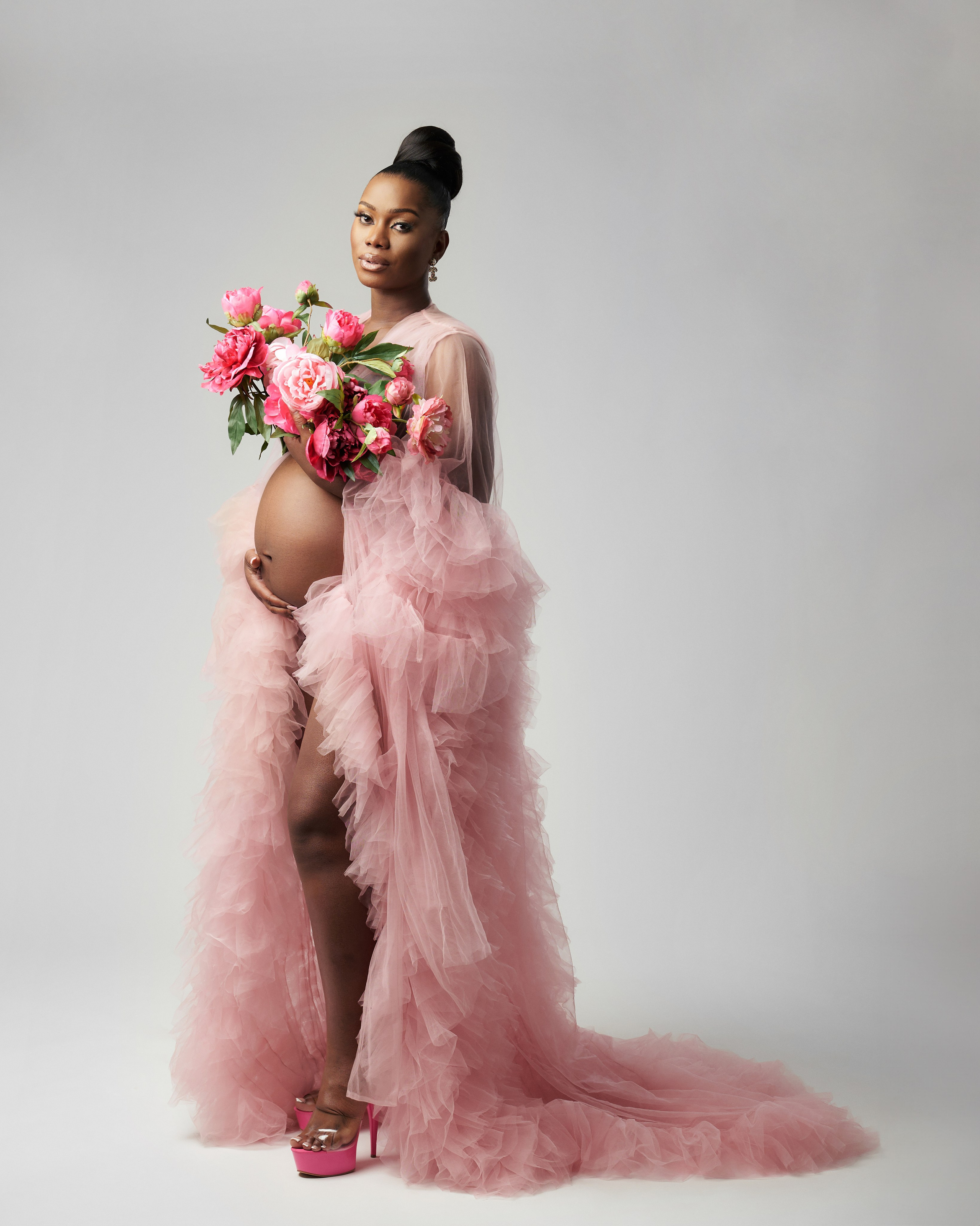 Pregnancy. Triple-A photo studio