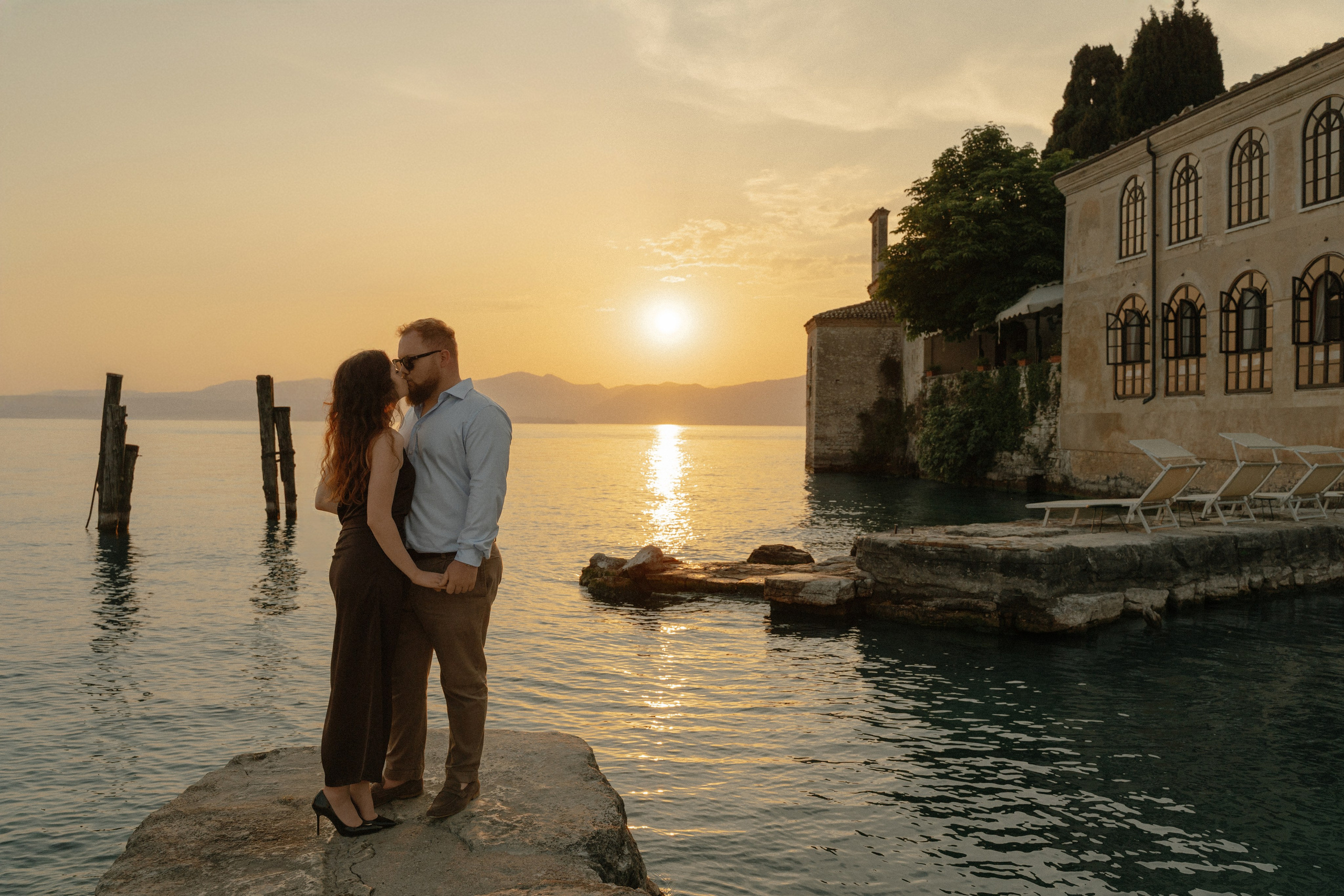 Surprise marriage proposal overlooking Lake Garda and  Punta San Vigilio