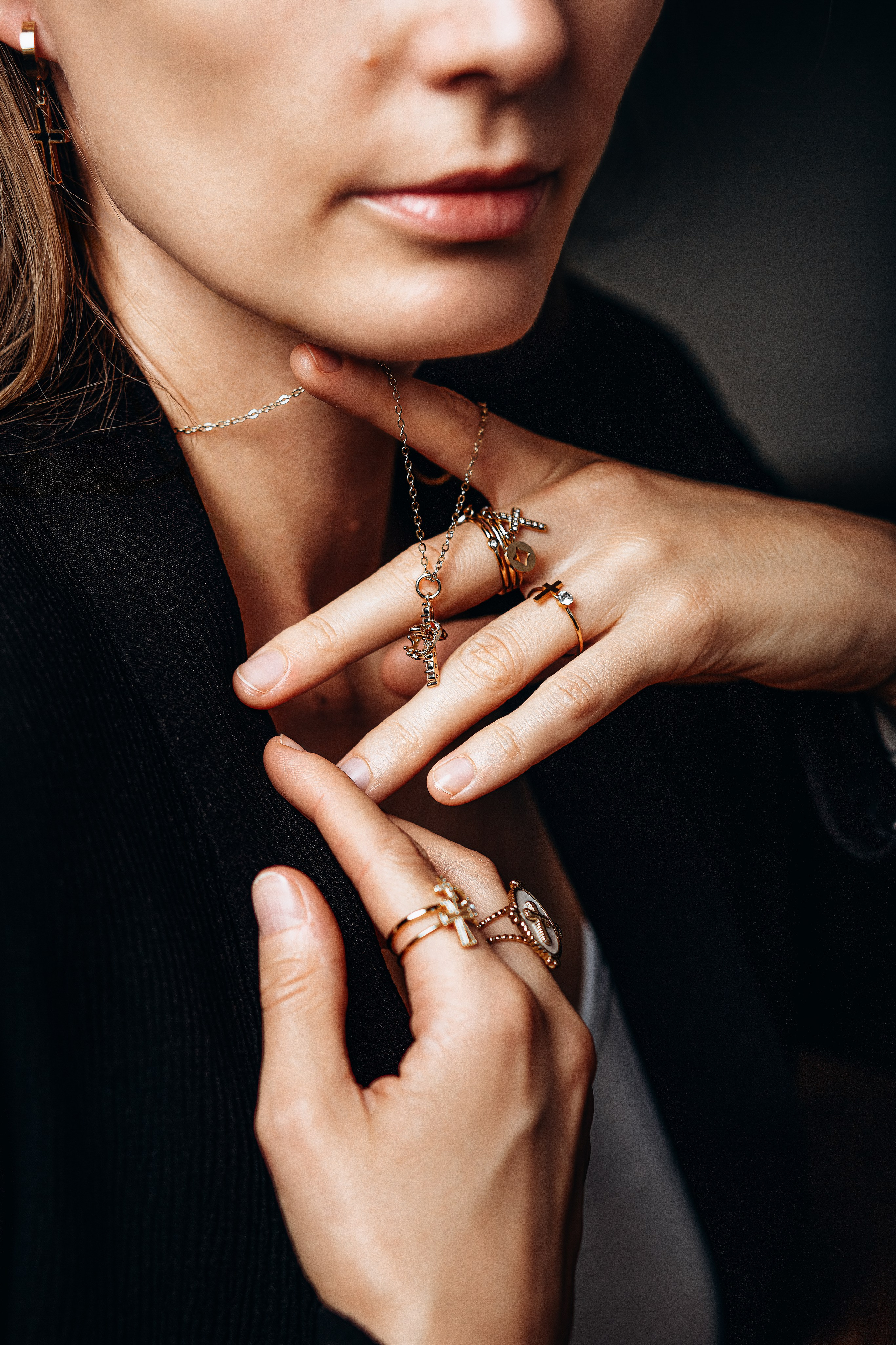 Artistic close-up jewelry brand photoshoot in Valencia, Spain showcasing layered silver necklaces, minimalist rings, and elegant styling — perfect for brands and content creators looking for premium product photography in Valencia or lifestyle branding across Spain.