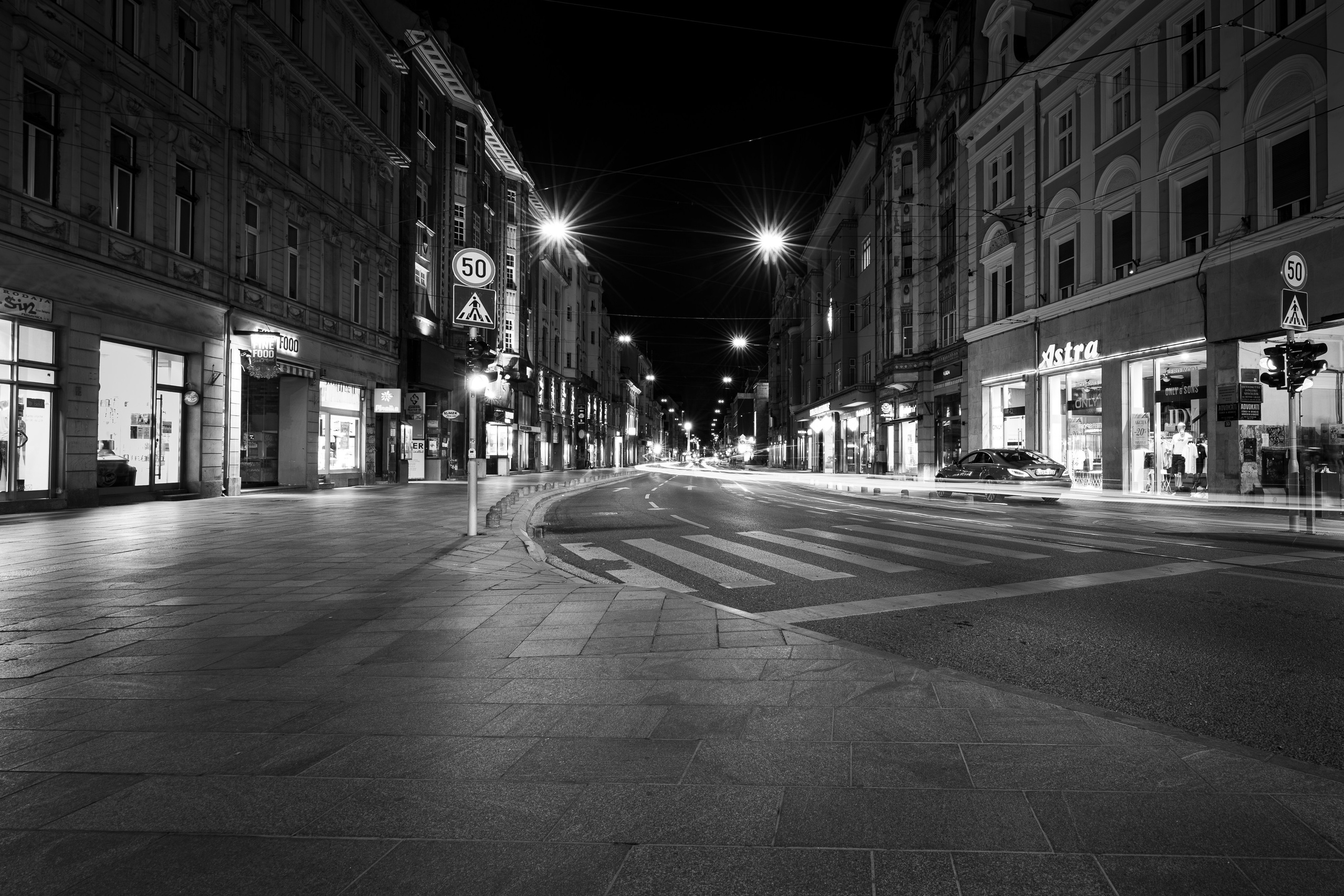 Sarajevo old town street at night captured through black and white photography