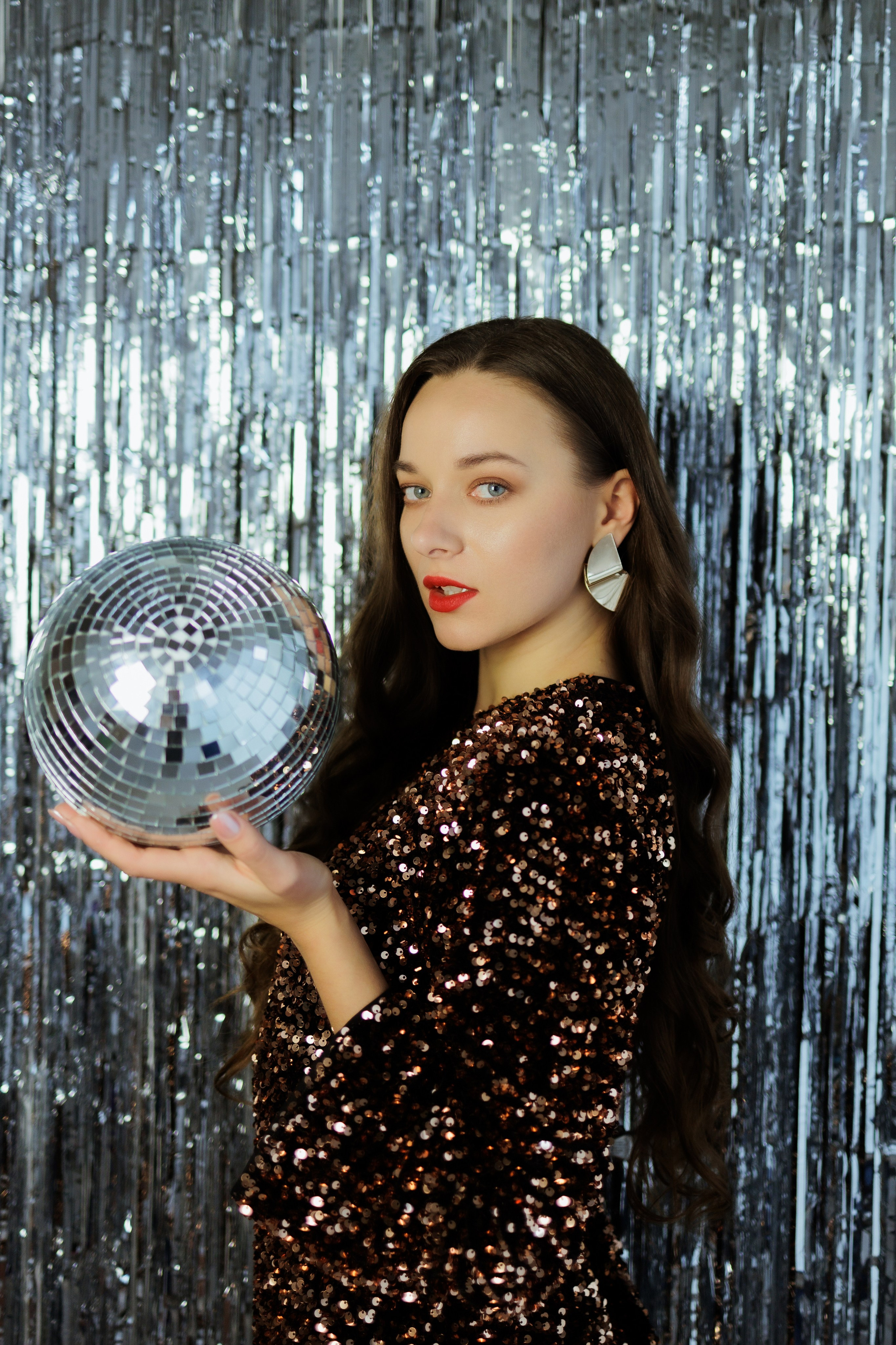 Glamorous Studio Photoshoot. Woman in Black Sequin Dress with Disco Ball. Kristina Kozheltsova- Soulful Portrait&Lifestyle&Love Story Photographer in Leipzig, Germany