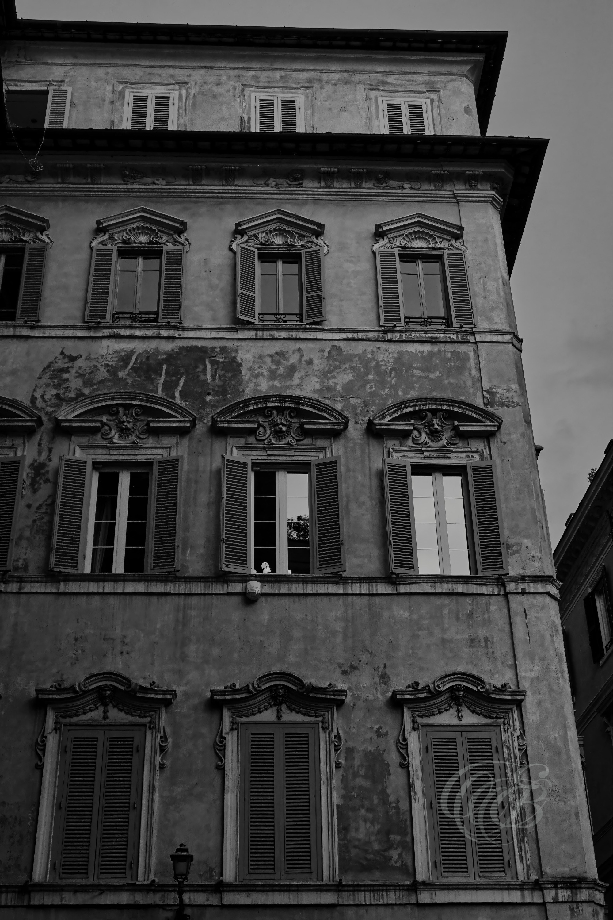 Street Photography — Rome, Italy — Salita del Grillo 24 — B&W — Black and white view of historic Salita del Grillo in Rome, emphasizing its medieval surroundings, aged architecture, narrow urban fabric, and timeless character — Eduardo Bartoli Photography.