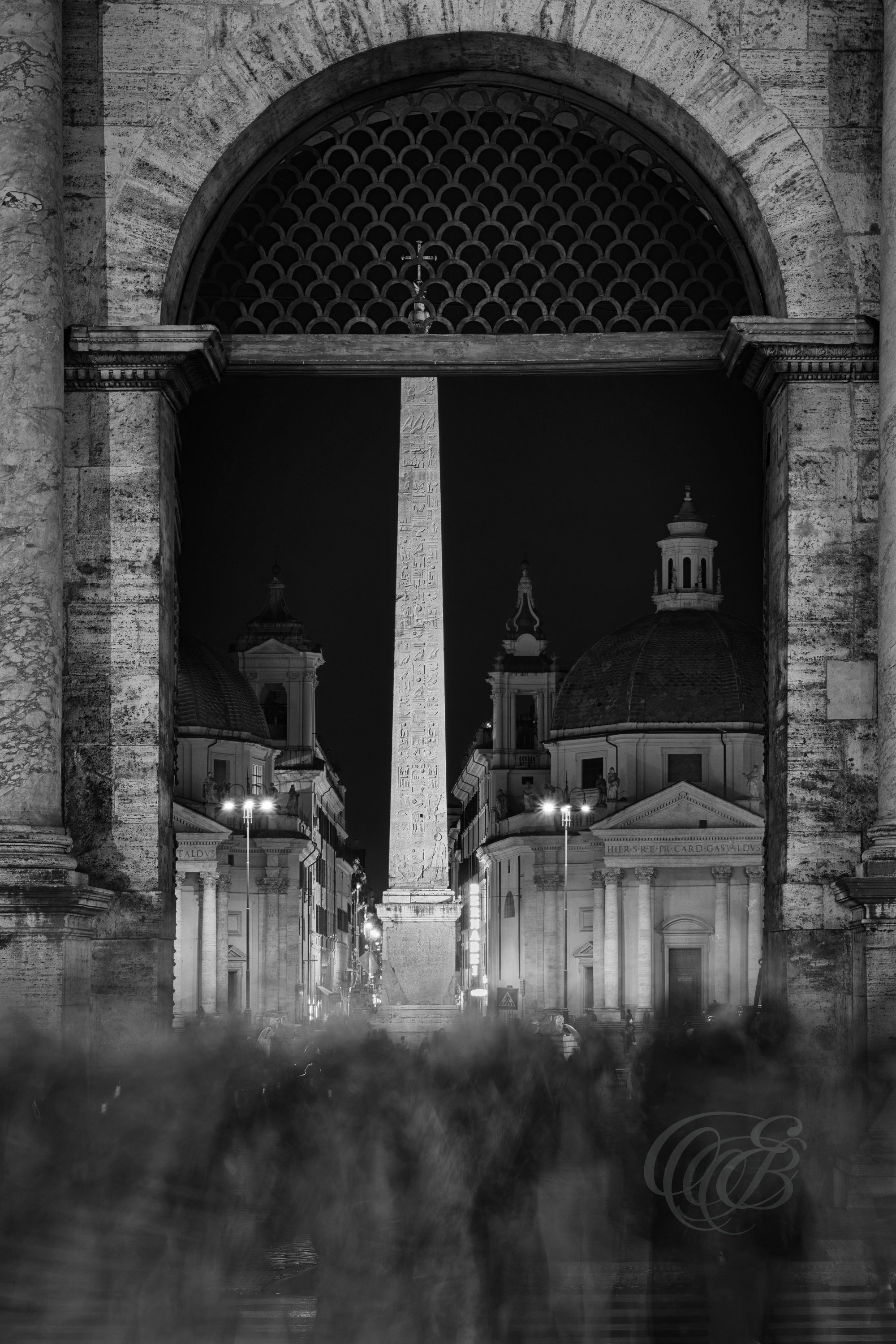 Street Photography — Rome, Italy — Porta del Popolo — B&W — Black and white view of the historic Porta del Popolo in Rome, emphasizing Renaissance architecture, monumental form, and its centuries-old role as a northern gateway into the city — Eduardo Bartoli Photography.