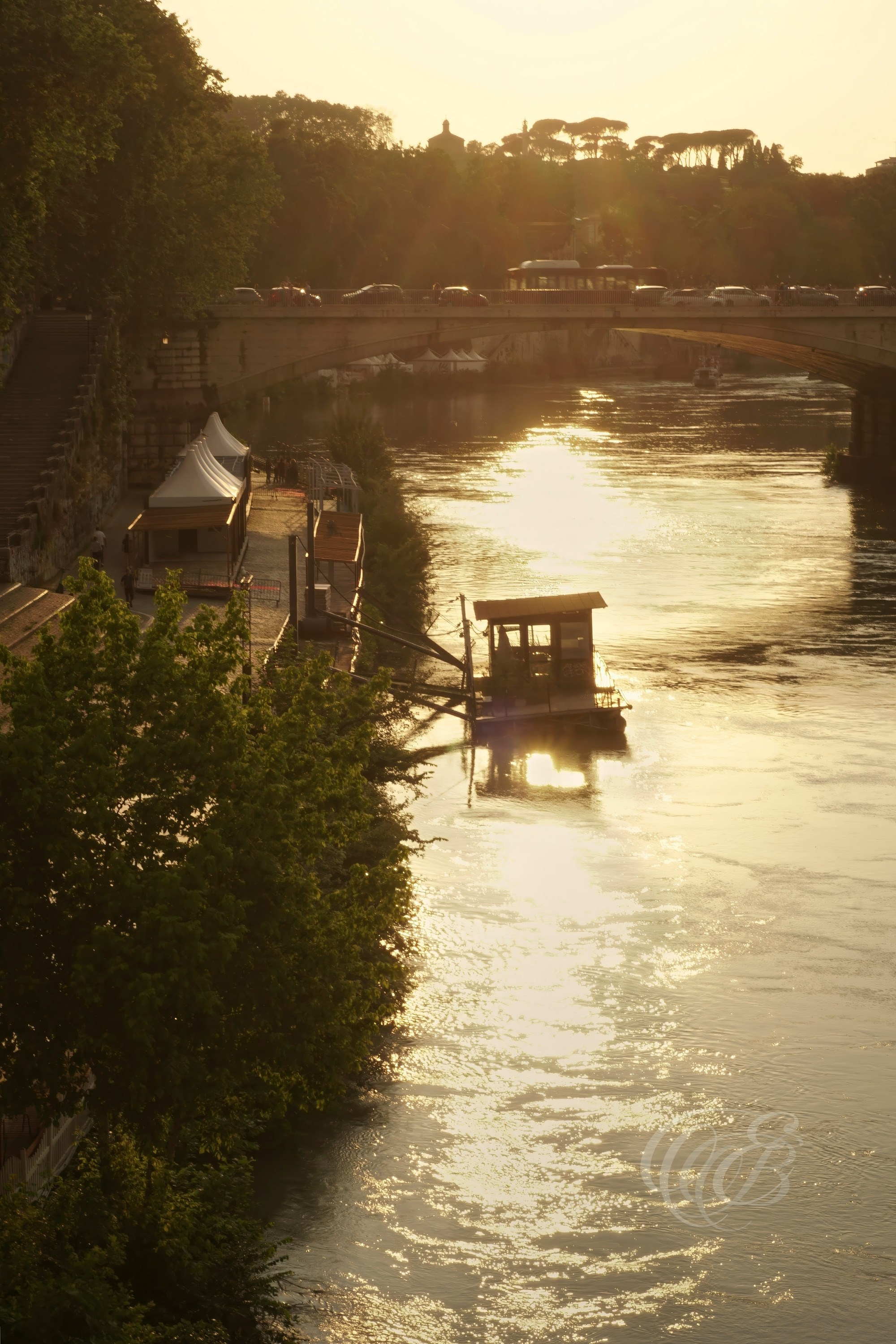 Street Photography — Rome, Italy — The Tiber at Sunset — Historic Tiber River at sunset in Rome, reflecting the ancient waterway’s enduring connection with the city, its bridges, riverbanks, and centuries of urban history — Eduardo Bartoli Photography.