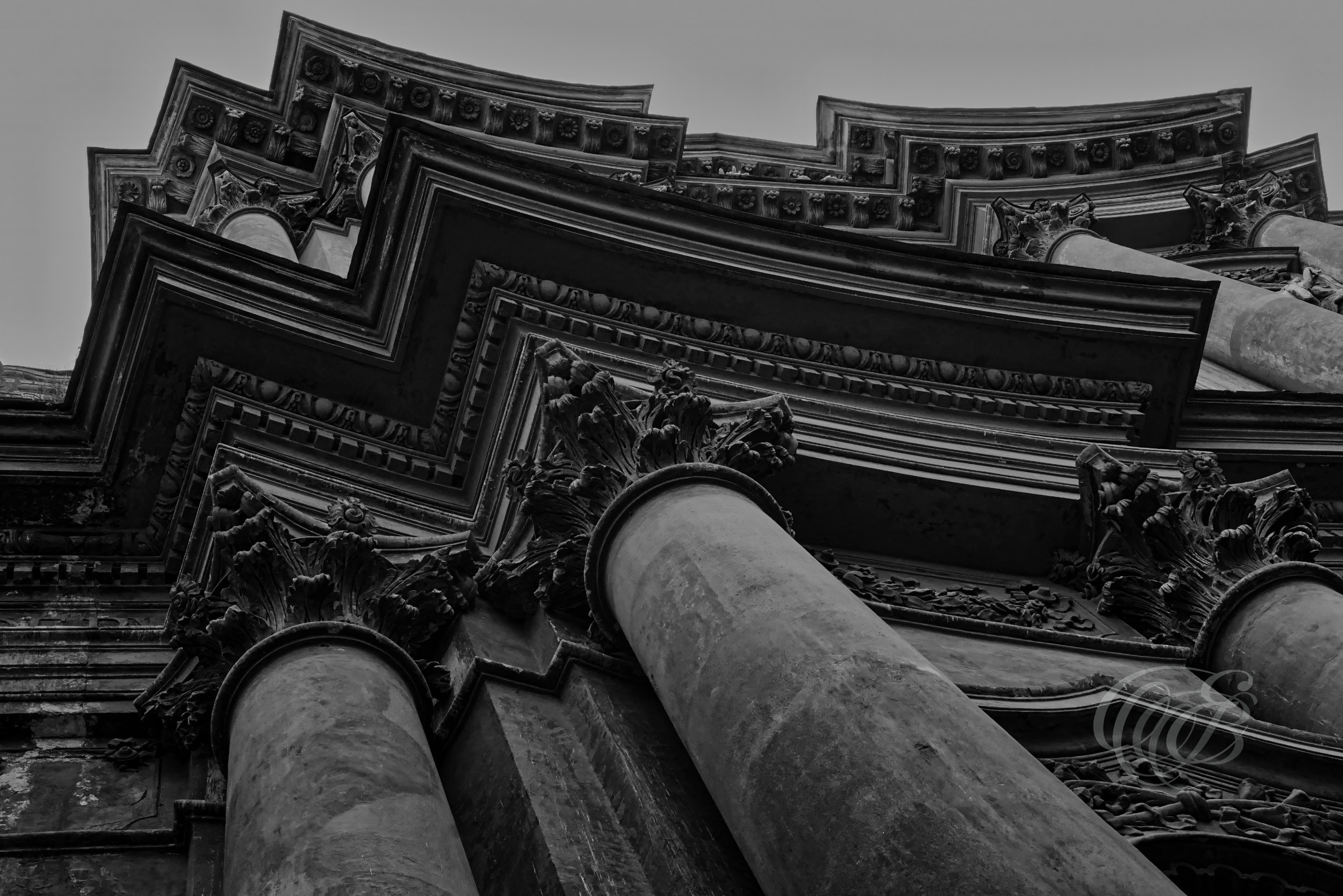Street Photography — Rome, Italy — Church della Santissima Trinità — B&W — Black and white interpretation of the Church della Santissima Trinità in Rome, emphasizing historic architecture, religious heritage, structural details, and tonal contrast — Eduardo Bartoli Photography.