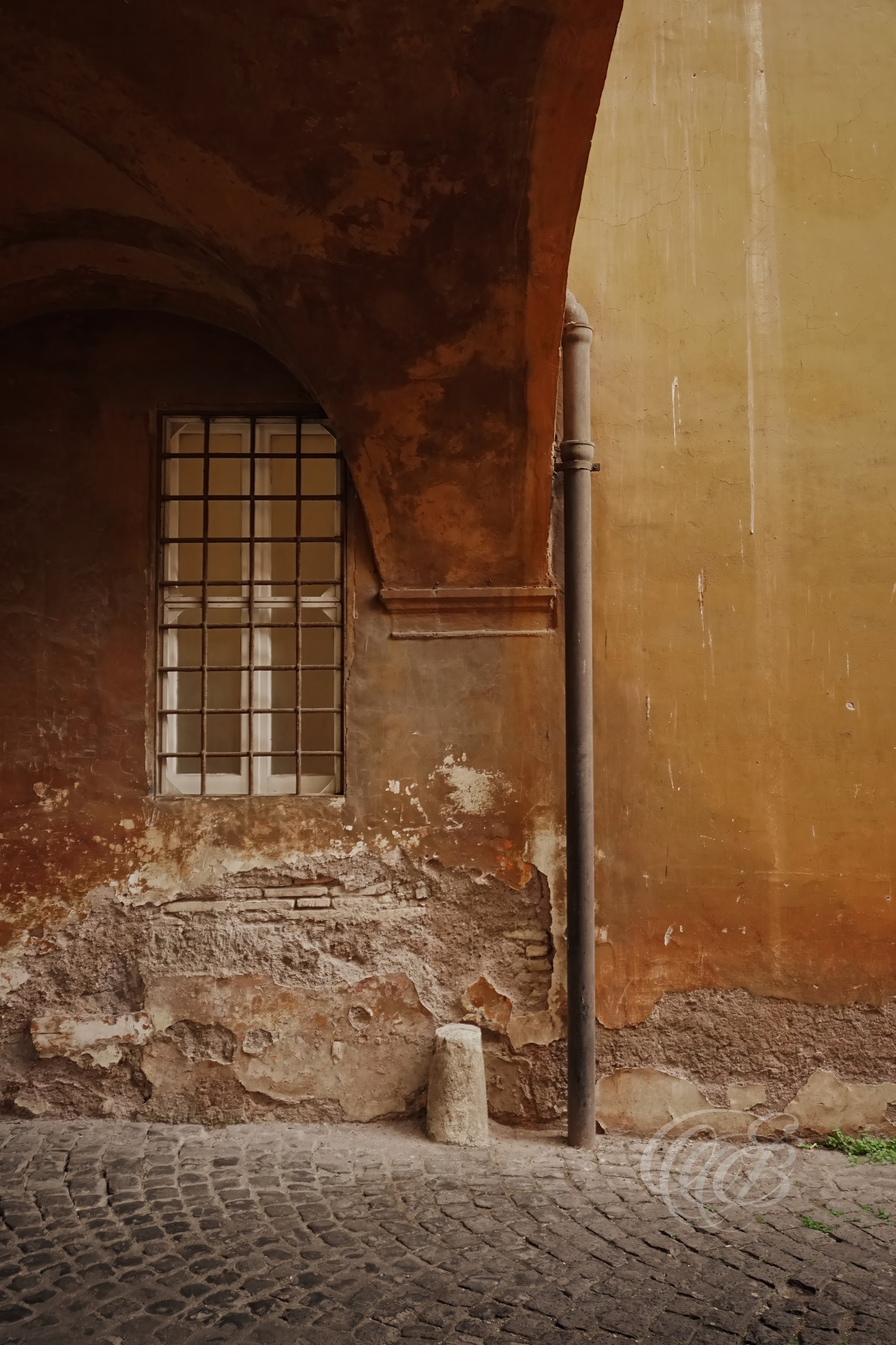 Street Photography — Rome, Italy — San Giovanni Hospital Window — Historic architectural detail at the San Giovanni hospital complex in Rome, reflecting centuries of medical tradition and the layered institutional history of the Lateran area — Eduardo Bartoli Photography.