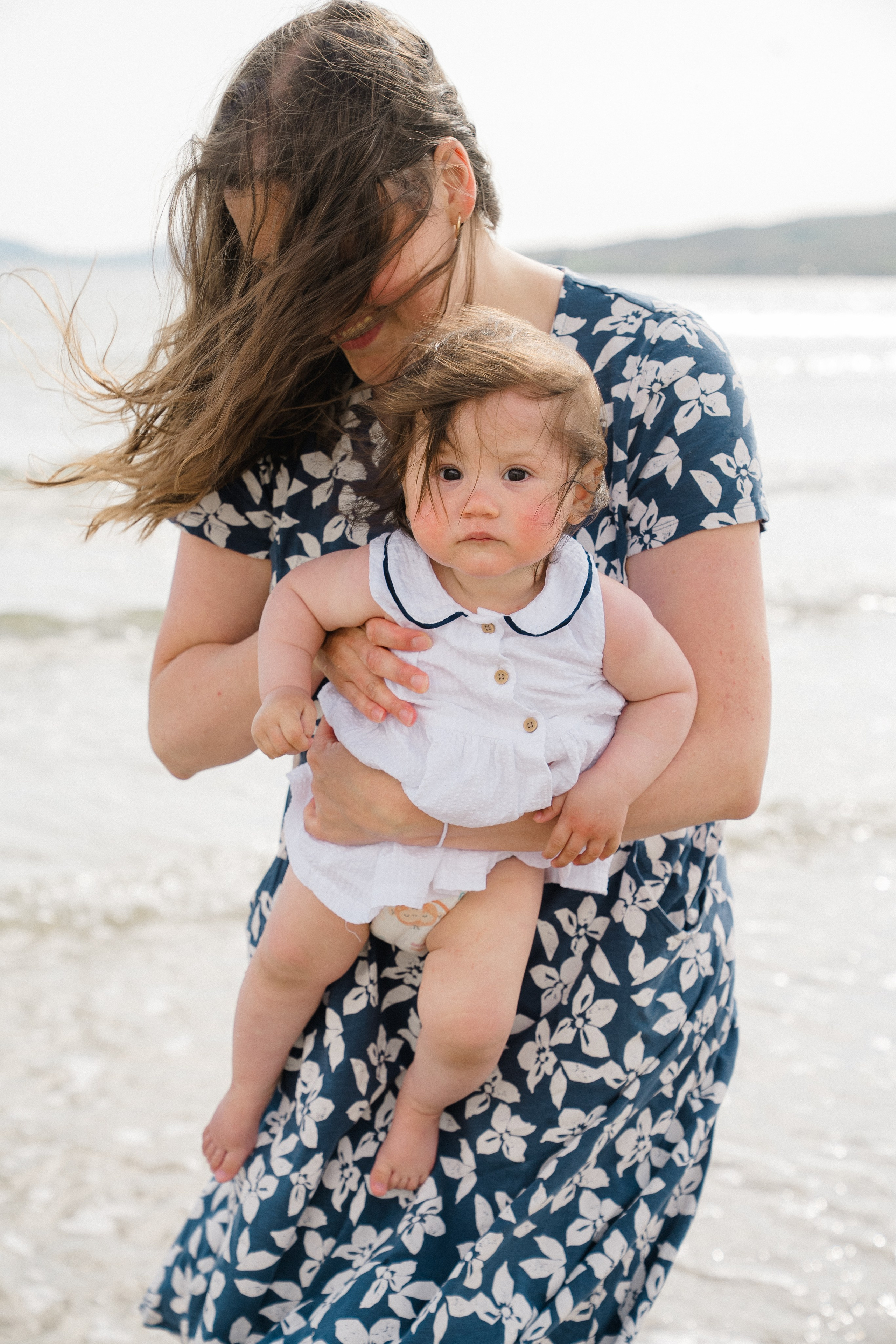 Darya and Mia at the ocean. Wedding and family photographer Ireland