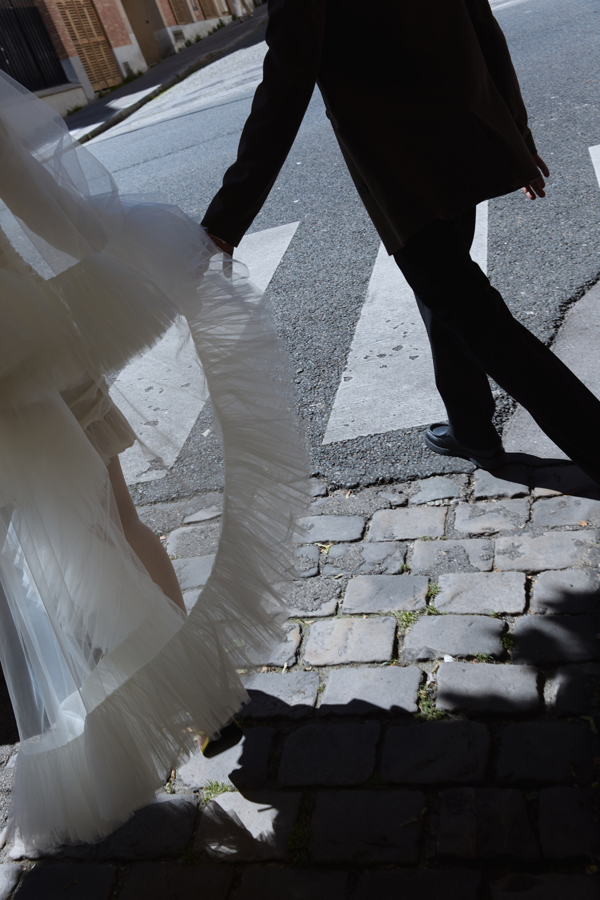 bride and groom on the streets of Paris