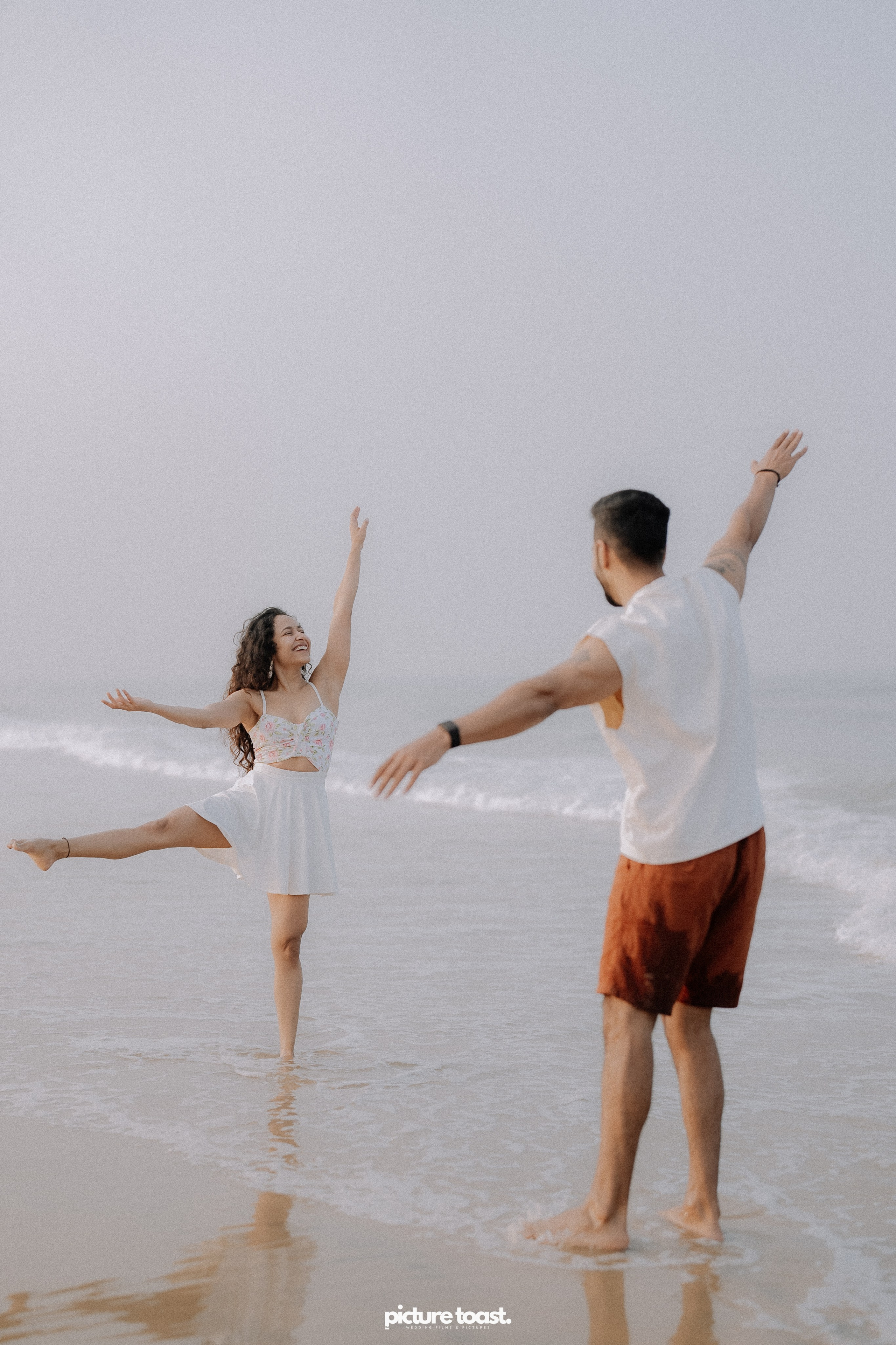 Love In The Beach. Fine art Wedding Photographers in India & Canada