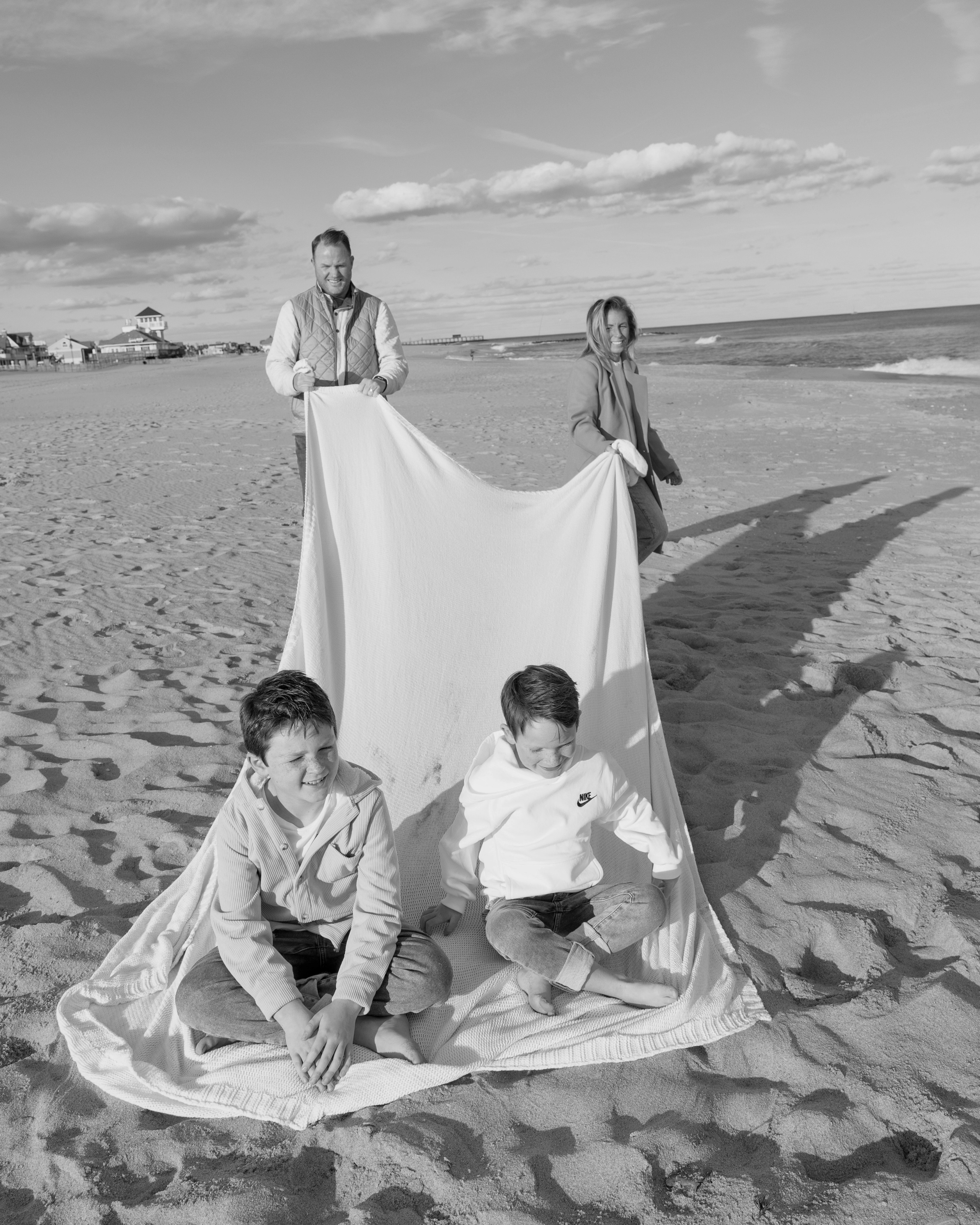 Sun, Sand, and Family Hugs. Family, lifestyle, and commercial photography in New York and New Jersey