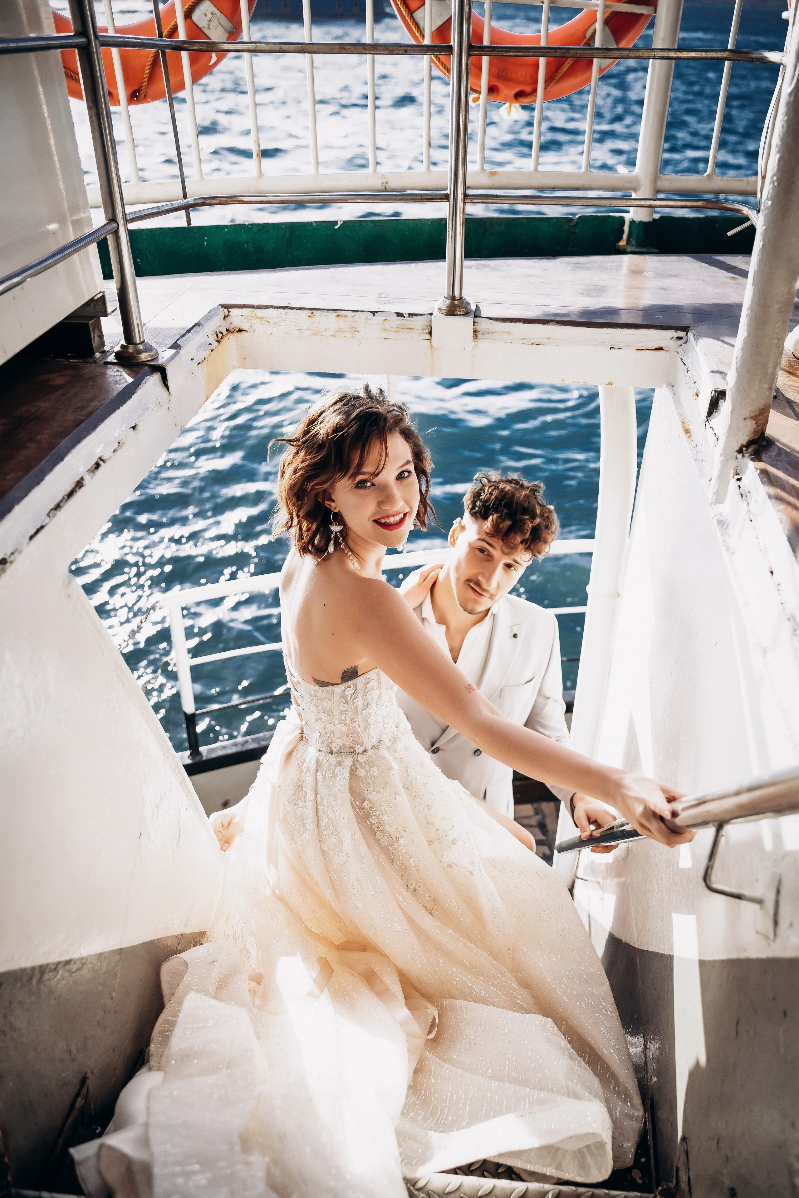 Destination wedding in Turkey – bride and groom on a yacht, Bosphorus view