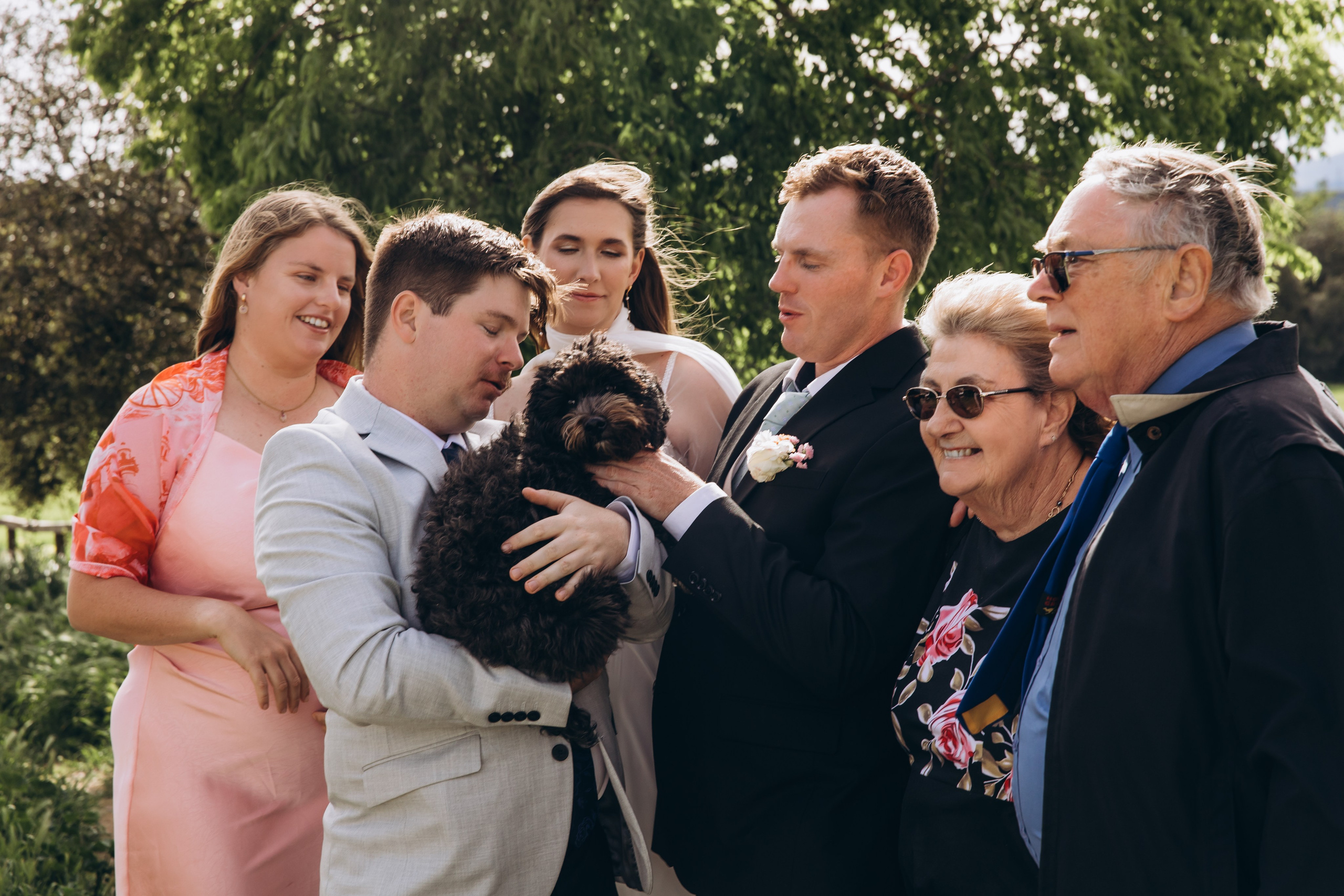 Couple walking hand in hand in Madrid streets – European destination wedding.